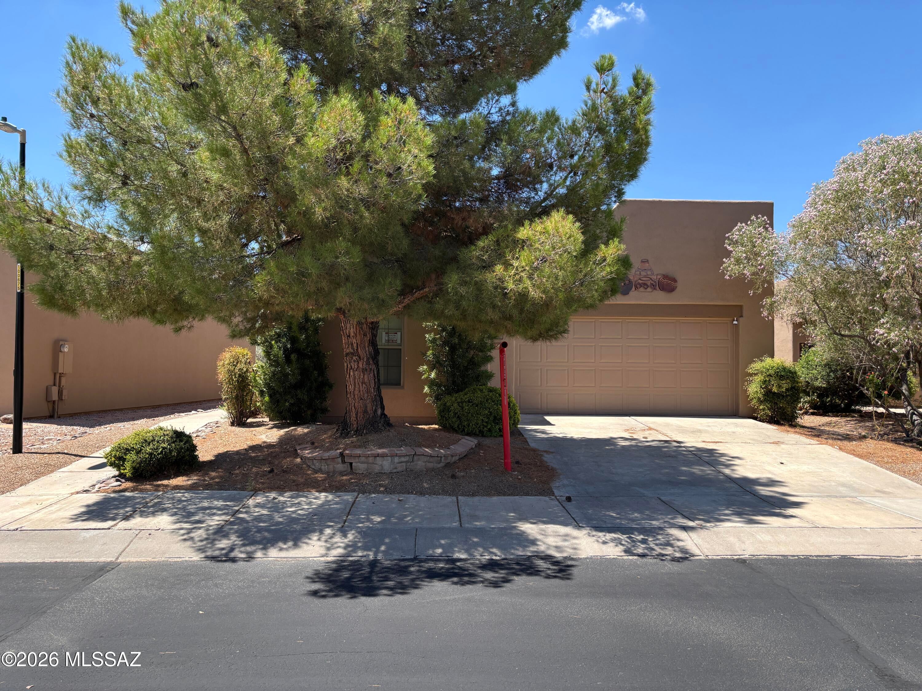 Beautiful 2 BD plus den 2 BA House in the Springs in Green Valley - GVR Included! ** MOVE-IN SPECIAL: 50% off first full month rent with 1-yr. lease. **

Large living/dining area with entertainment wall and fireplace. Separate breakfast area at the end of the kitchen. Kitchen includes electric stove, side by side refrigerator, over the stove microwave, dishwasher and large pantry. The primary bedroom has its own bath and walk-in closet at the back of the house. Front guest room has a door that closes it off from the rest of the house with the bathroom, making it a separate suite. Convenient office just off dining room. Ceramic tile and luxury vinyl plank flooring throughout. Washer & dryer included.  A walled yard with a large covered patio and a double garage complete this lovely home.