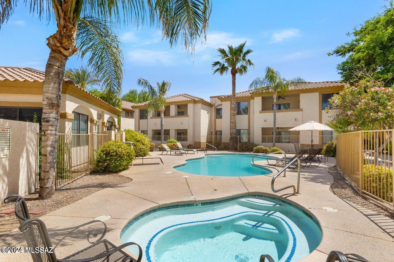 Welcome to your dream home in the prestigious Villas at Hacienda Del Sol! Nestled in the picturesque foothills, this gated, resort-style community offers the perfect blend of luxury and convenience. Just minutes from St. Philips Plaza, you'll enjoy easy access to fine dining, shopping, commercial amenities, and groceries. This immaculate 3-bedroom, 2-bath condo boasts an abundance of natural light, enhanced by custom shutters installed on all windows. The kitchen is a chef's delight, featuring all stainless steel appliances and stunning granite countertops that extend to the bathroom vanities. A versatile bonus space, created by enclosing the outdoor patio, can serve as an office, additional den, or formal dining room. Enjoy all the amenities like the pool area and gym facilities.