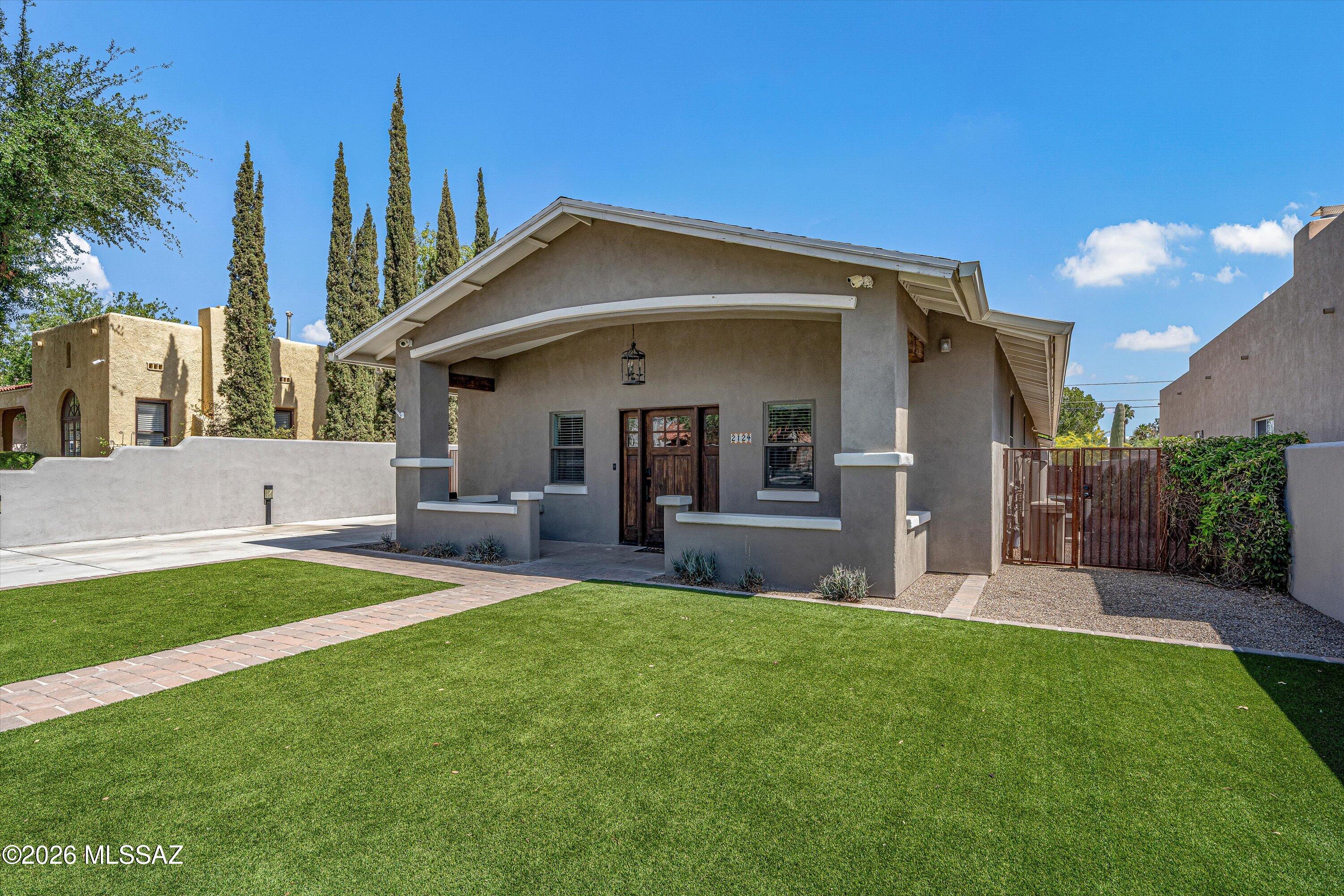Fabulous Home built in 2013 in Sam Hughes area by U of A. Authentic design meets unrivaled modern amenities (including 3 car garage and finishing touches . 4 Bd/4 bath main house plus 1 bd/1bath w separate entry, above garage, guest quarters w/kitchenette & own off street parking. Chef kitchen w custom cabinetry & gorgeous countertop, top-notch stainless steel appliances & island w /breakfast bar. Kitchen opens to outdoor dining area w/wet bar (beer tap and wine cooler). Impeccable master suite (walk- in closet & extra closet space-Calif Closets) Master bath w double vanity sinks,walk-in shower & beautiful tub. Large basement w/entertainment area w Br/Ba.
Guest quarters w/washer/dryer & kitchenette. Great Location w blocks to UofA & city trolley. Solar on roof = little or no electric bill