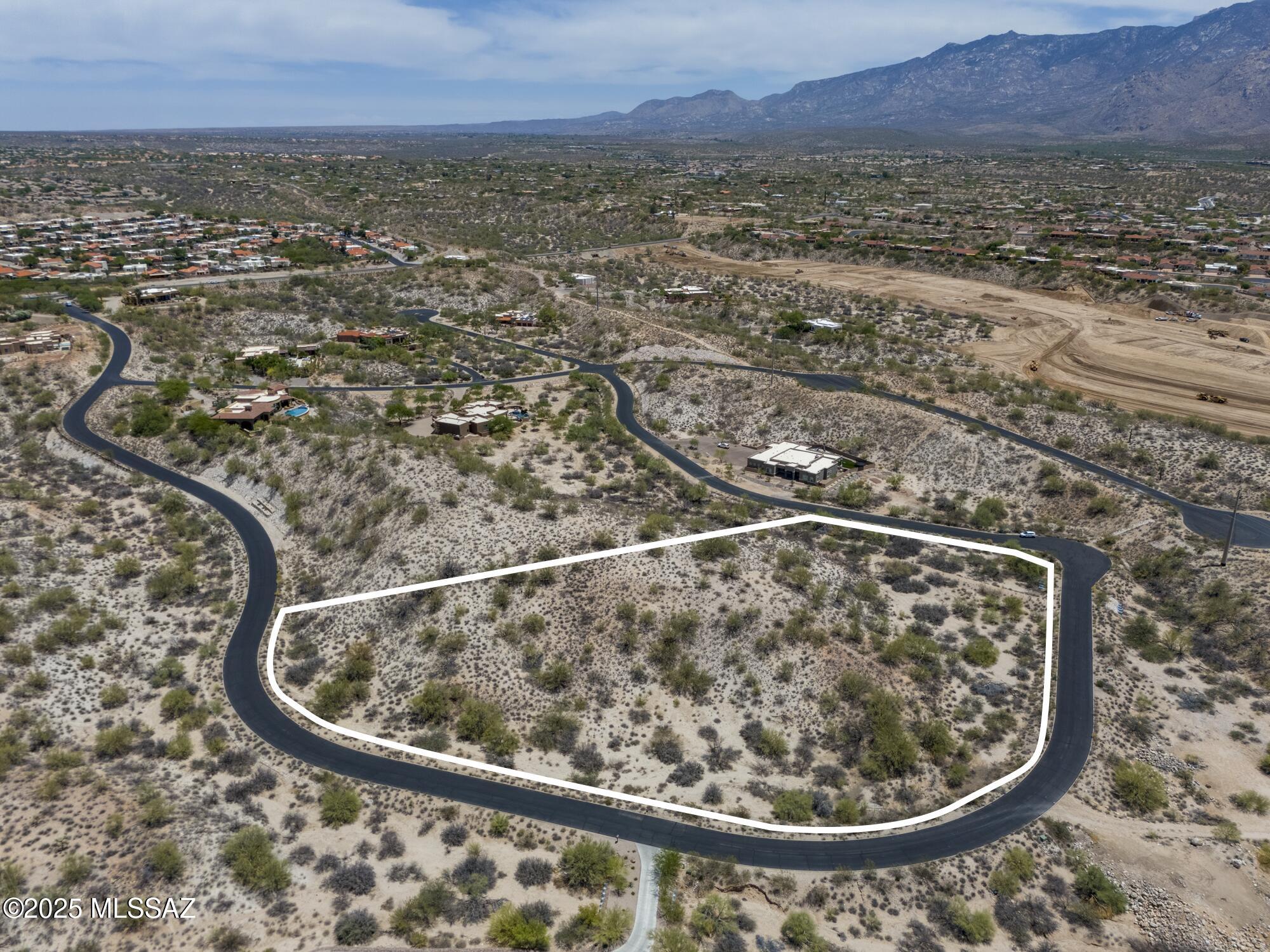 Private 3.3+ acre residential lot tucked away in a secluded gated community.  Incredible 180 degree Pusch Ridge and city views.  Clost to shopping ammenities and minutes to down Tucson.  Agent related to Seller.