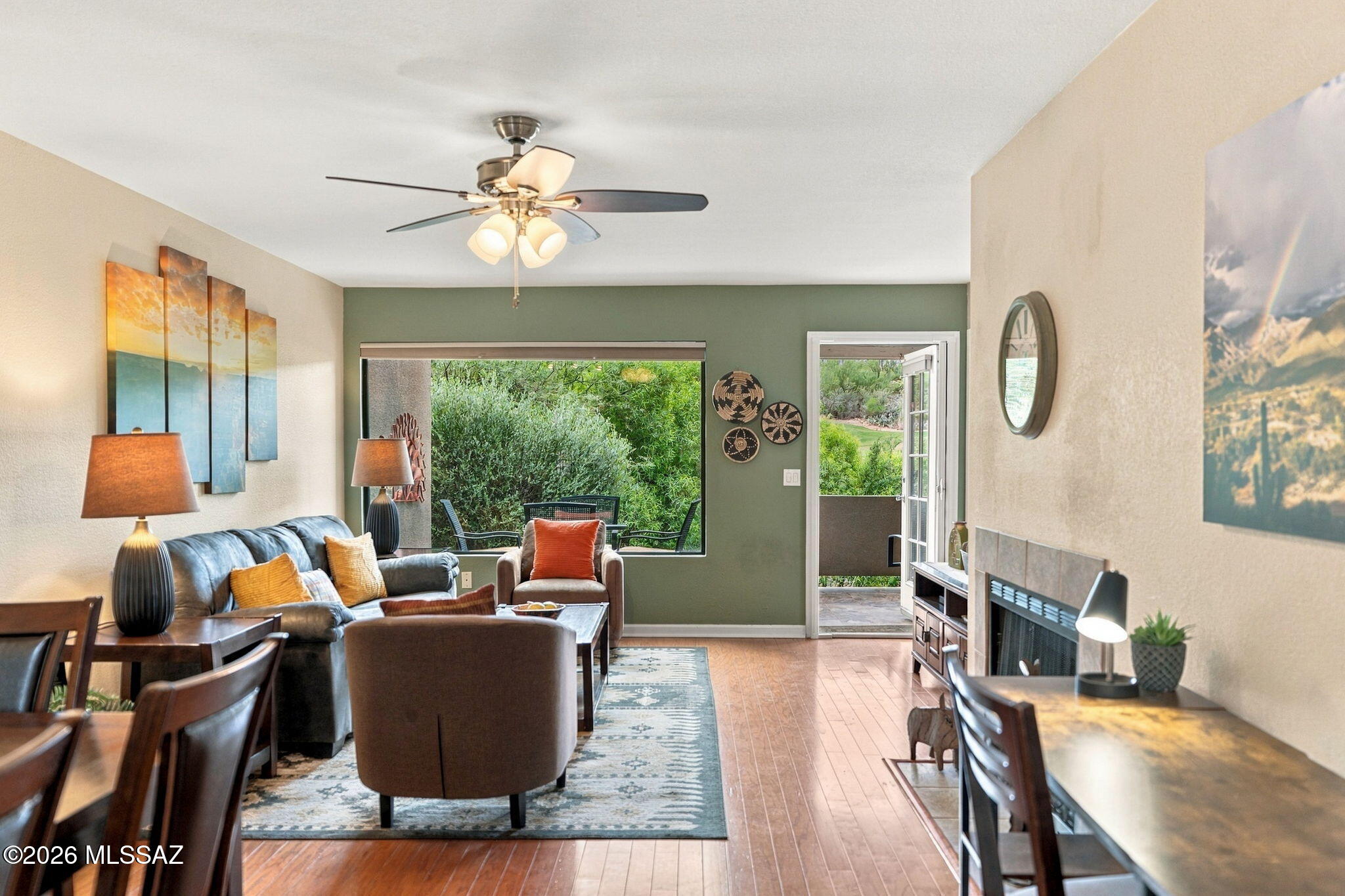 This beautifully updated, turn-key 2BD, 2BA condo offers comfortable AZ living. A rare extended, tiled patio overlooks a peaceful greenbelt with golf course views. It's a private and inviting outdoor retreat, perfect for morning coffee, entertaining, or simply enjoying the beautiful Tucson surroundings.

Inside, the light-filled living room features a new large picture window that brings the greenbelt views indoors and creates a wonderful connection to the expanded patio. New chairs add to the room's comfortable and welcoming atmosphere. The primary bathroom features a newer walk-in shower, adding both comfort and convenience.

The Greens offers an exceptional array of resort-style amenities, including three heated pools, two spas, a fitness center, and vibrant social clubs.