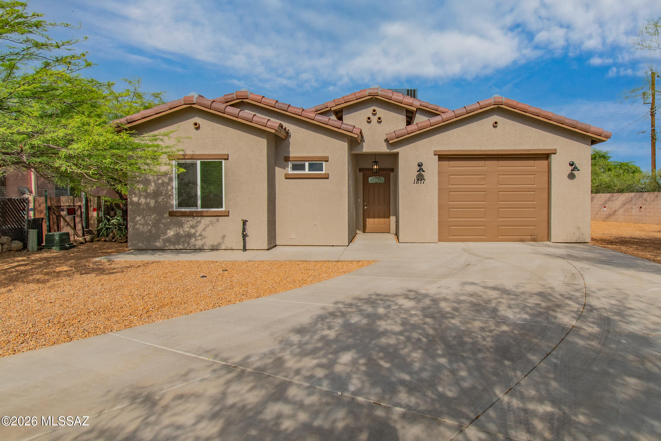 Beautiful New Construction Home. 3 Bedroom 2 Bath . This home will feature all new tile thru out, stainless steel appliances. Kitchen includes Incredible counter space, cabinet space. Beautiful Granite counters through out home.   Attached garage, Great location, Close to I-10 for easy commuting as well as shopping around the corner. dining, and close to golf courses,  Reid Park.
 Listing Agent is related to Seller.