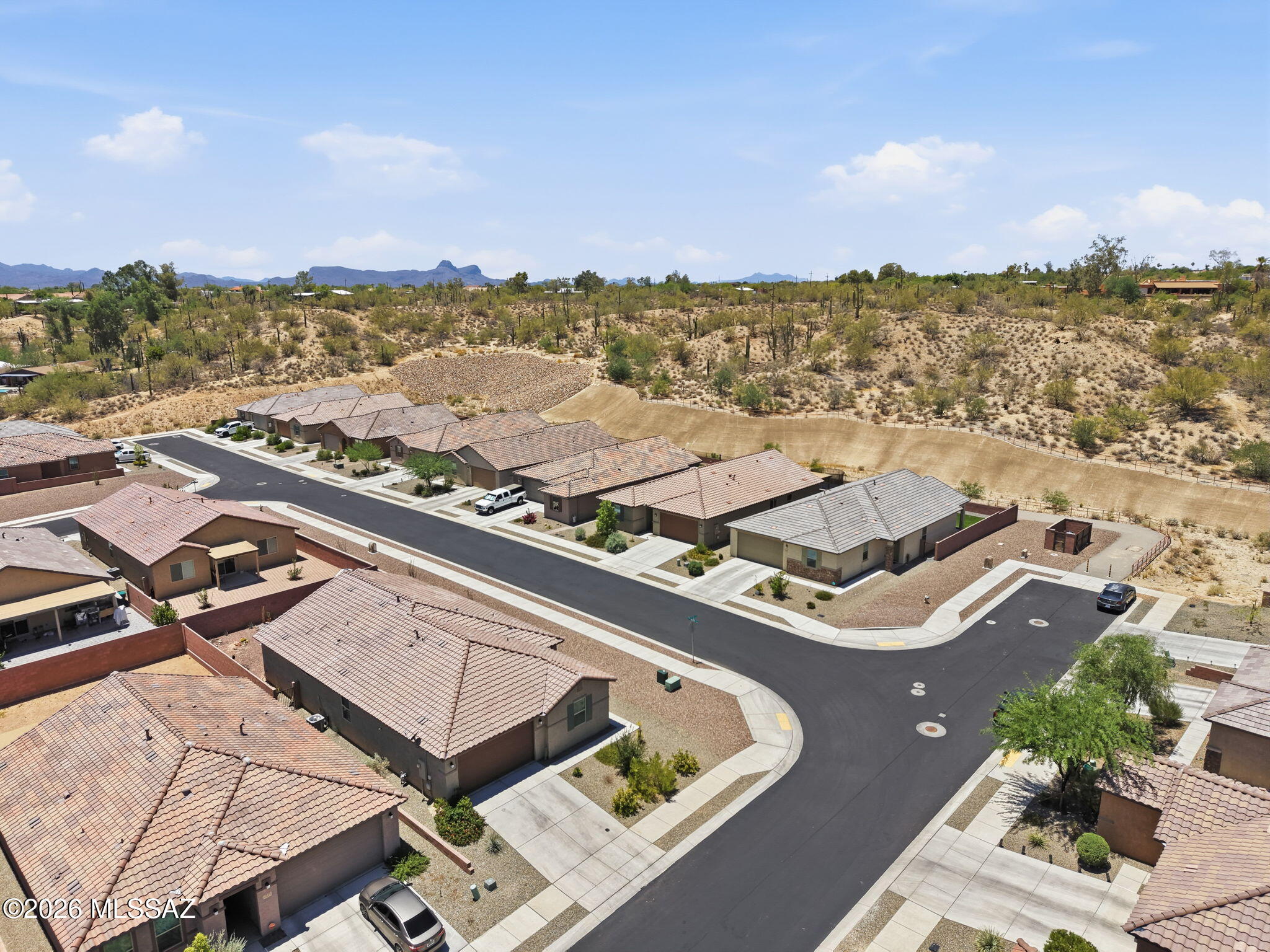 One of a kind ''Corner Lot!'' Built in 2023 and gently lived in, this beautifully maintained Vista Del Oro home offers the perfect blend of modern design and move-in-ready convenience. Situated on a desirable corner lot. This popular split-bedroom  floor plan features 3 bedrooms plus a versatile den/office, ideal for working from home or additional living space. The spacious kitchen showcases granite countertops, stainless steel appliances, a gas range, abundant cabinetry and ample workspace for everyday living and entertaining. Additional highlights include plantation shutters, tankless water heater, professionally landscaped yard and motorized patio sunshades.This like-new home has been meticulously cared for and move-in ready!