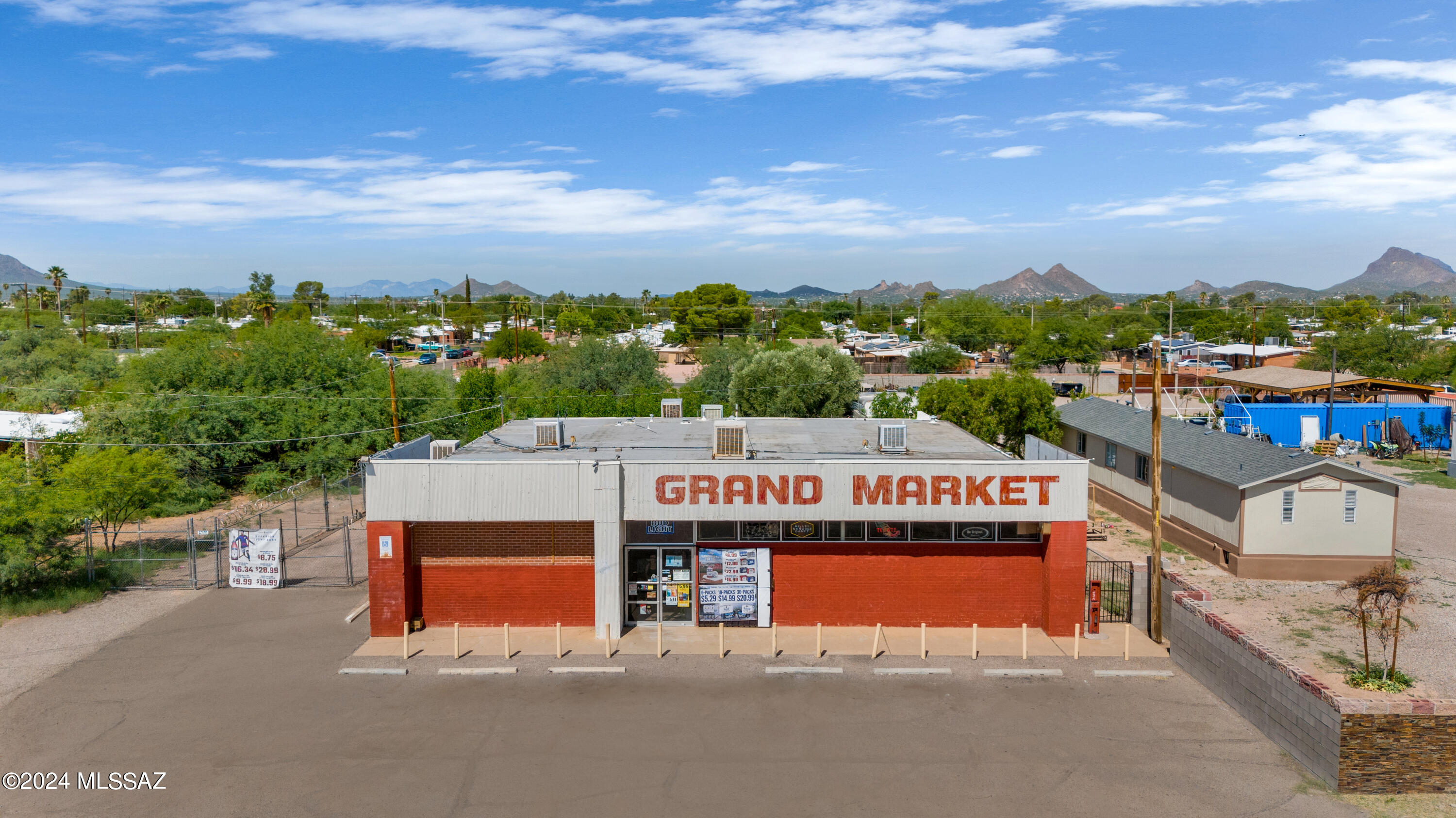 Unique Mixed-Use Opportunity Near Tucson International Airport.
This 1967-built property presents a rare chance to own a versatile space with both commercial and residential potential. Located just 3 miles from Tucson International Airport, it's a prime investment for entrepreneurs or investors. The retail portion--currently operating as a grocery store--offers a spacious layout ideal for launching a new venture or reconfiguring to suit your needs. Attached living quarters provide convenient on-site housing or potential rental income. Additional highlights include ample storage areas and off-street parking. The possibilities here are endless. Grocery Business is NOT included in the sale.