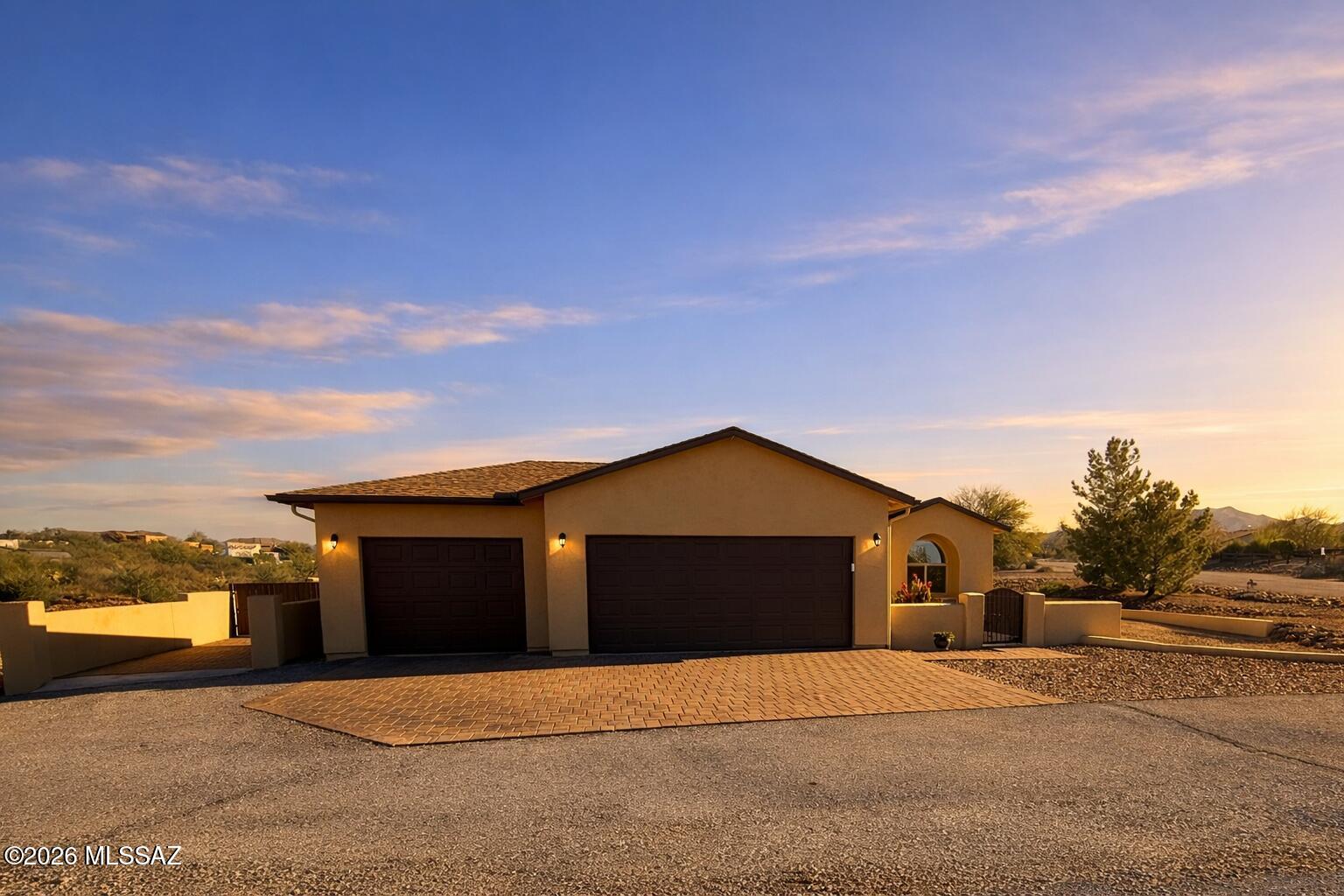 1.1-acre property featuring a 1,595 sq ft main home with 3 bedrooms, 2 bathrooms and 3-car garage, plus a fully equipped 607 sq ft attached Guest home with private entrance. Both home and guest house offer 9-foot ceilings and ceramic tile flooring throughout. The main home showcases solid core alder interior doors and matching alder kitchen cabinetry. The attached guest house (added in 2019) includes a full kitchen with stove, refrigerator, microwave, stainless steel sink with window above, tile shower, stackable washer and dryer, mini-split A/C system, spacious walk-in closet, separate utility closet with shelving, and its own 40-gallon water heater. Roofs on both structures were replaced in 2026 ample paved parking, clearly marked survey pins, no HOA separate septic's each 1,000 gallons