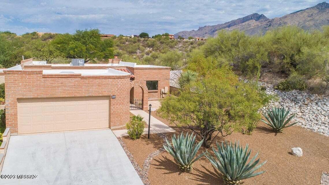 VIEWS,VIEWS,VIEWS - Beautiful Fairfield  home on very private  corner lot featuring Amazing mountain and desert views. This unique home is completely upgraded - two bedroom two bath home  with office in very sought after Sunrise  Ridge townhomes. Pristine kitchen with quartz countertops  & marble backsplash. SS appliances with Large breakfast bar & opens up to great room with gas fireplace, 2 car garage with epoxy floors.  Community pool, spa, & tennis courts. Must see tovappreciate.