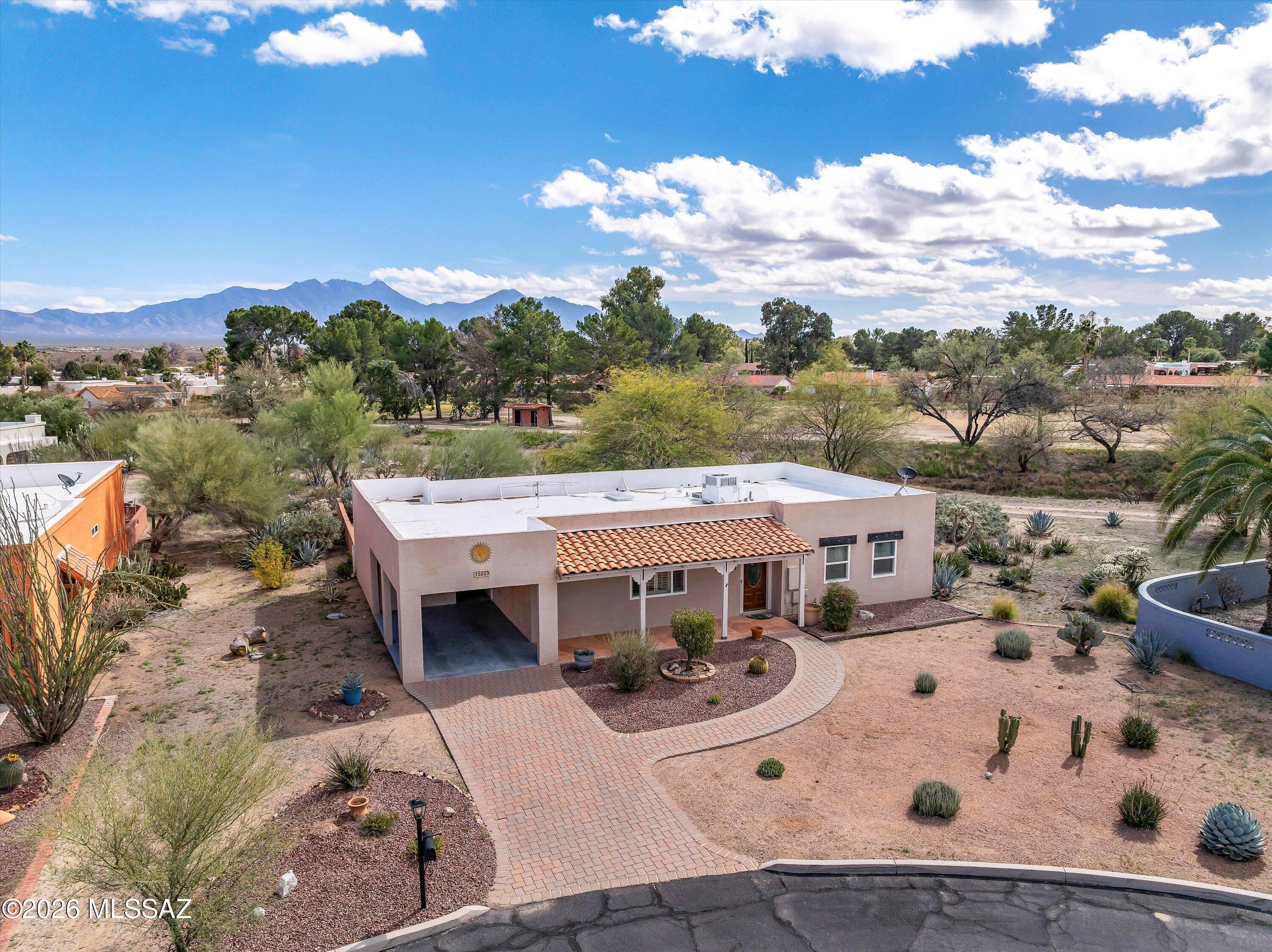 Price Range Listing : Seller will accept or counter offers between $249,900 - $259,900. Charming home with fantastic curb appeal in the desirable Country Club North community of Green Valley! This beautifully maintained property offers an open and bright living area that feels welcoming from the moment you step inside, an updated kitchen with rollouts and lazy susan, updated primary bathroom with a walk-in shower and floating bench, large laundry room with additional storage, ceramic tile throughout, dual pane windows and a built-in Murphy Bed, allowing the space to easily transition from a comfortable guest room to a home office or flex room. Enjoy Arizona living year-round in the enclosed Arizona room - perfect for relaxing, entertaining, or creating your ideal hobby space. The large backyard offers exceptional privacy with no rear neighbors, giving you peaceful outdoor enjoyment and plenty of room to make it your own. Ideally located within walking distance to one of Green Valley's popular recreation centers featuring a lap pool and jacuzzi, and just minutes from shopping, restaurants, and easy interstate access. This home truly combines comfort, privacy, and convenience in one perfect package!
