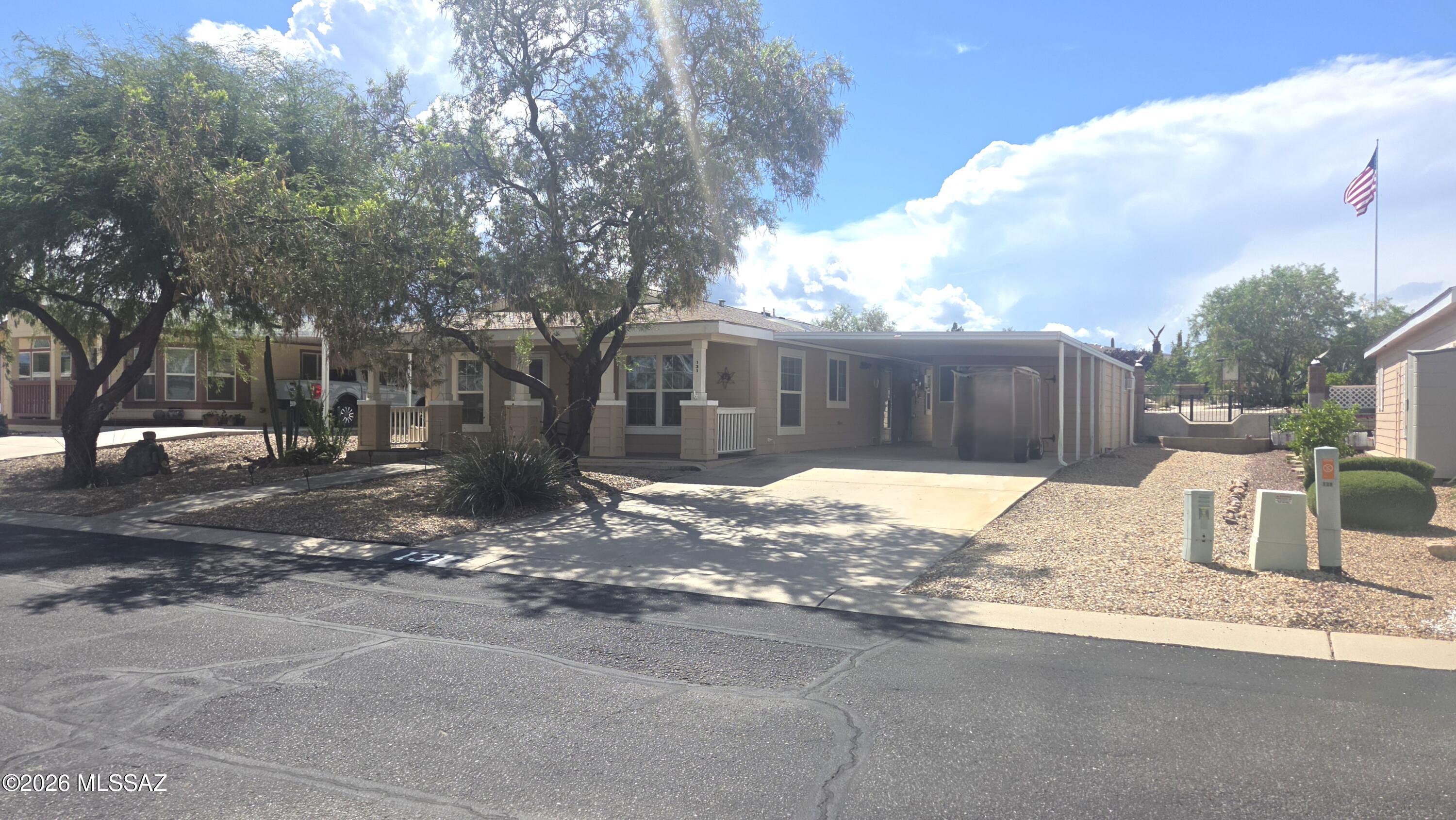 In addition to the 2 bedrooms and 2 full bathrooms this 2006 Palm Harbor has several new and upgraded items. 
The kitchen has a new convection stove and  dishwasher. 
The water heater was recenlty upgraded to electric after the installation of the Solar system to the home.  The Solar System is owned and will convey with the property.
The shed is sectioned off into two sheds with the front half for storage and golf cart storage while the rear section has AC and could be used for a small office if desired.