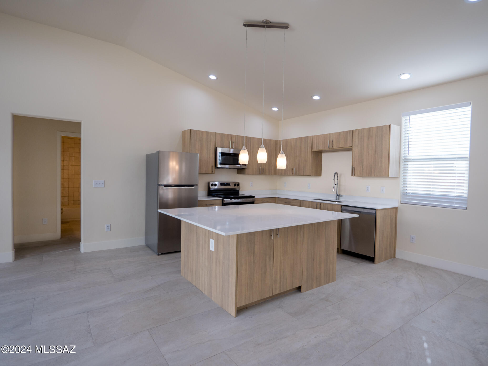 *AVAILABLE FOR JUNE MOVE IN* Text for a Walkthrough Video/more info. 2024 Construction w/ Premium Finishes abound in this 3 Bedroom/2 Bathroom 1429sf Duplex Unit located in Central Tucson near Shopping, Restaurants, Banner Medical Center, University of Arizona, and Downtown. The open and airy interior features include; Entertainer's Kitchen w/ oversized Island, Solid Surface counters, Stainless Appliances, Contemporary Cabinetry; Master Suite w/ Dual Vanities, tiled Shower, Walk-in Closet; oversized Ceramic Tile throughout Unit; Window Wall w/ access to the private yard; Central A/C; and Washer + Dryer included. 12mo minimum Lease, Costs are: Non-refundable $50/adult Application, $2050 Security Deposit, $150/pet with approved pet, $400 cleaning. Tenants pay electric only.
