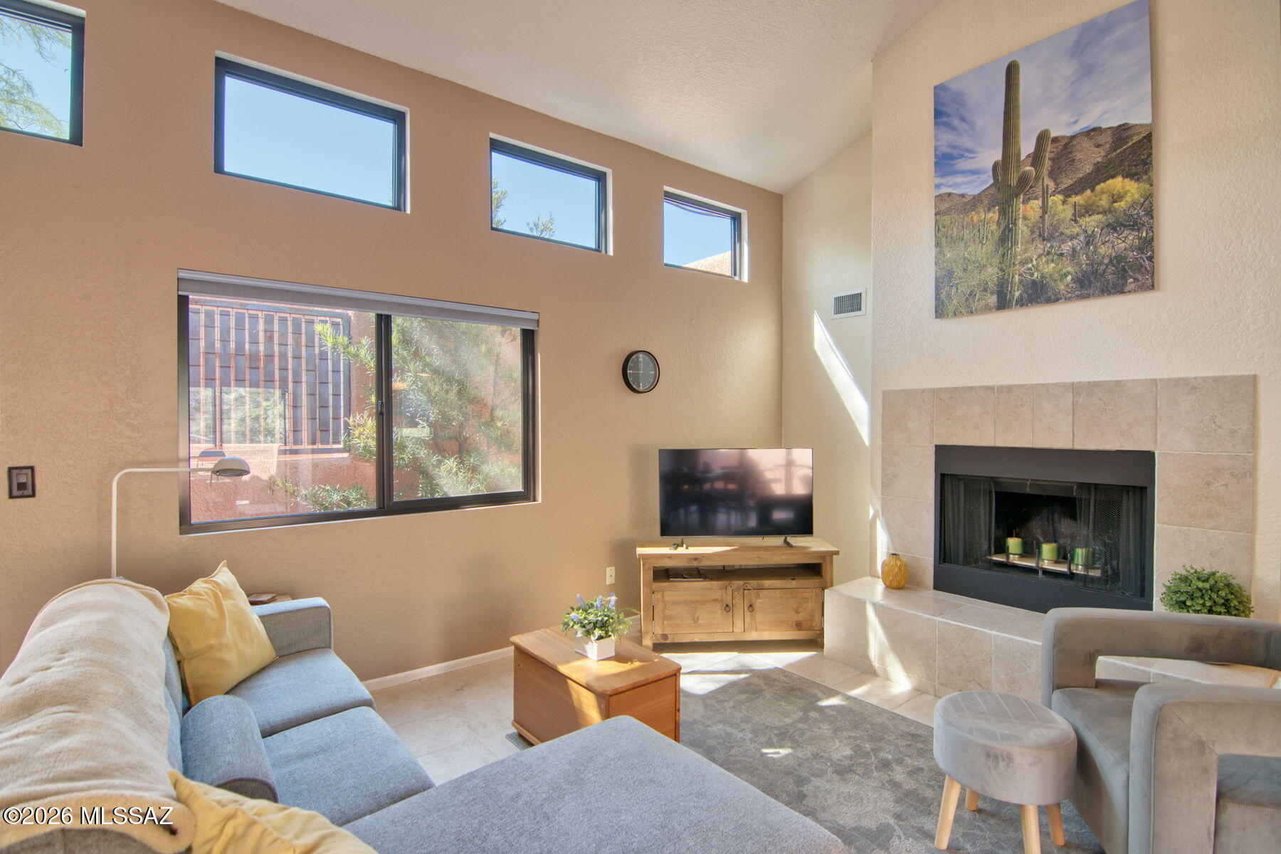 Come and experience the highly sought after Ventana Vista condominiums! Are you ready for sunshine, hiking, pickle ball, and a mountain view! Here's your chance. This spacious and bright 3 bedroom comes fully furnished and ready for you to start enjoying! Updates throughout include no carpet, walk in shower, one newer AC and water heater! Walking distance to sabino canyon and three canyon beer and wine garden! Community is gated and has 2 sparkling pools, jacuzzi, fitness room, clubhouse, tennis courts, pickleball and covered parking. What more could you ask for.
