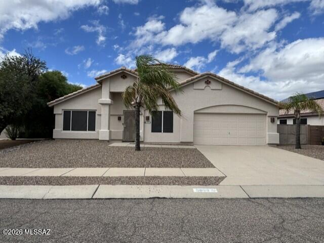 Beautifully maintained 3BR/2BA home in a convenient NW location! Inviting floor plan features a living room with a cozy gas fireplace, vaulted ceilings, and tile flooring throughout with LVP in bedrooms. Remodeled kitchen boasts gorgeous cabinetry, stainless steel appliances, a breakfast bar, and a wall of pantry cabinets with pull-out shelving. Refrigerator, washer, and dryer convey. Enjoy the spacious primary suite with a walk-in closet and bath featuring a separate tub and shower. Family room off the kitchen plus a large bonus room provide flexible living spaces. Step outside to a stunning backyard with extended covered patio, pool, spa, view fencing, & enjoy gazing over the 15 acres of HOA-owned protected common area. Paid solar system included for energy savings. A must-see home!
