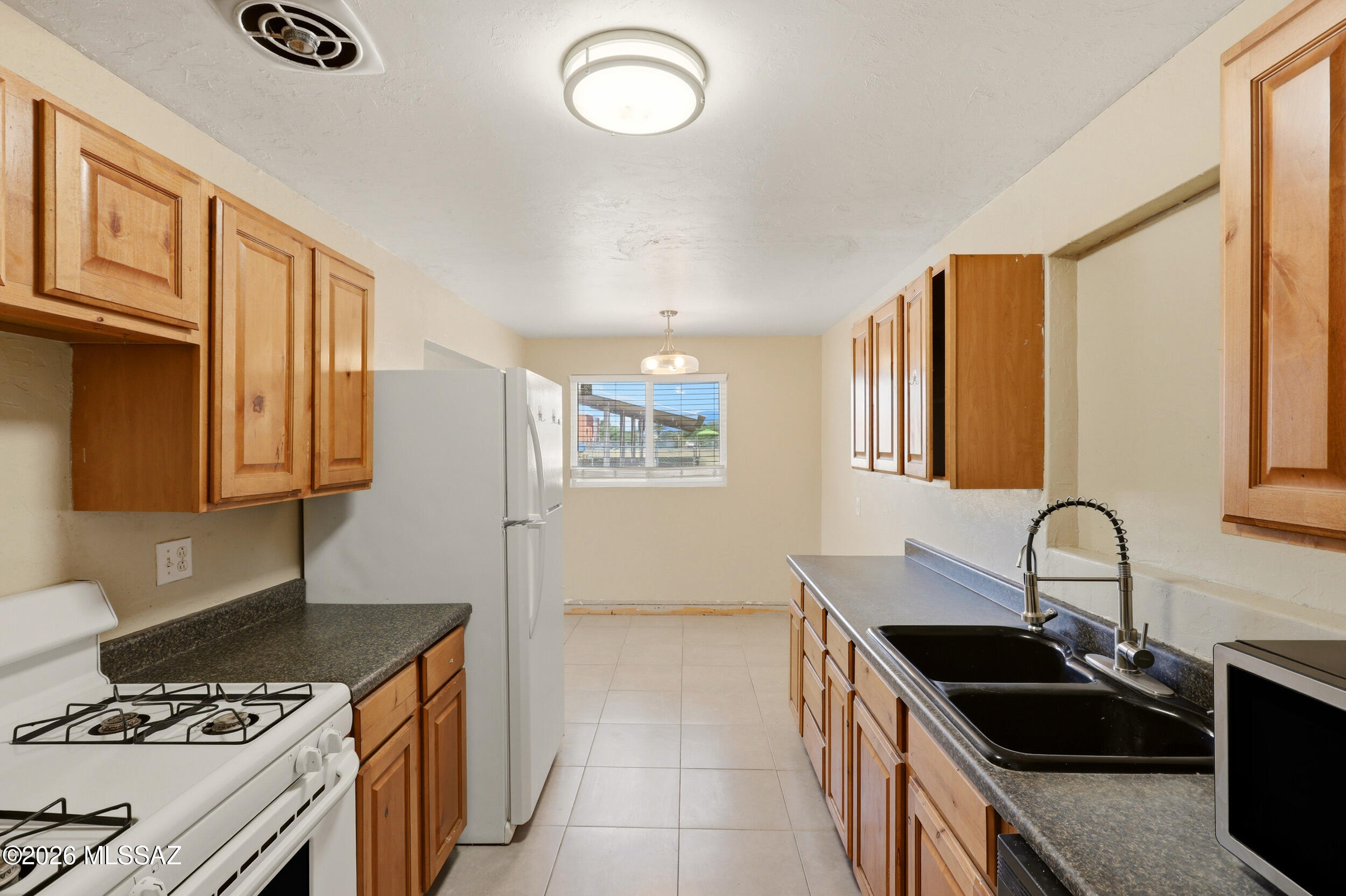 Opportunity knocks! This solid 4-bedroom, 2-bath home is ready for its next chapter and offers incredible potential for investors, flippers, or buyers looking to build equity. With great bones, a functional layout, and major updates already started, this fixer-upper is the perfect canvas to make your own. Enjoy the peace of mind of a new water heater and a newer roof, allowing you to focus your budget on cosmetic improvements and personalization. Conveniently located near shopping, dining, schools, parks, and commuter routes, this property is full of possibilities. Bring your vision and transform this house into something truly special!