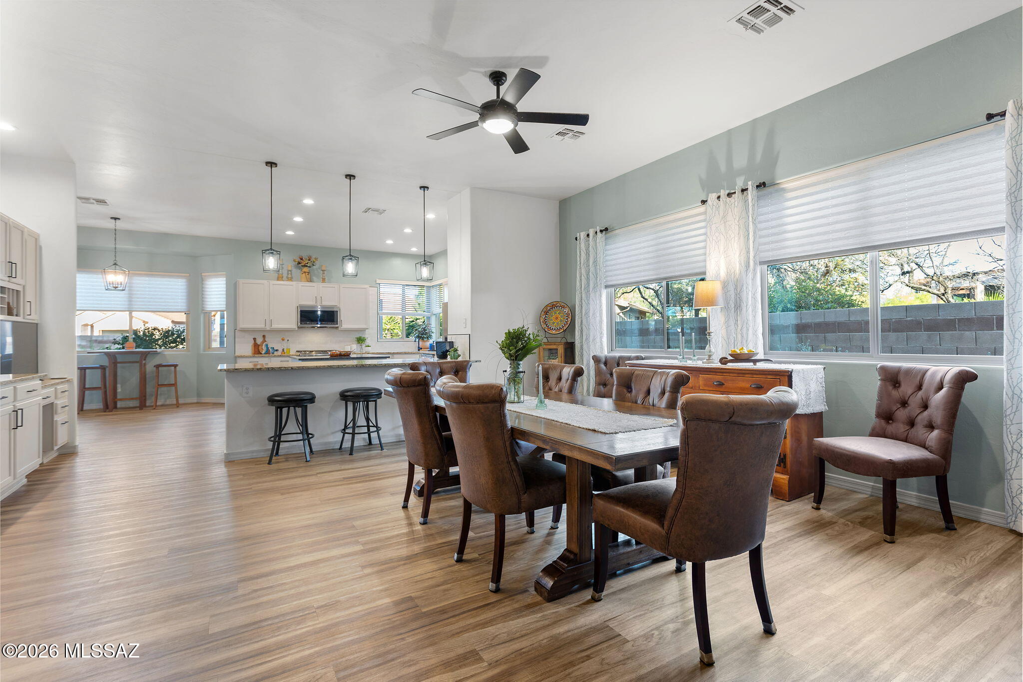 Nestled in the gated community of Rancho Cancion, this 3 bedroom + den, 2.5 bath home showcases a desirable split floor plan, soaring ceilings & a grand columned entry. The updated kitchen features an island, peninsula w/ breakfast bar & built-in buffet perfect for a coffee bar or entertaining! The backyard is a true private retreat w/ an extended covered patio, flagstone walkways & desert plantings. A retractable gazebo featuring a prep island w/ granite counters, cabinetry, outdoor-rated mini fridge, electrical outlets & gas stub. Enjoy the pool w/ a tranquil fountain feature. Corner lot w/ double gate access to a spacious side yard offering a Tuff Shed, turf and paver multi-use space, plus spa electrical (current spa could convey w/acceptable offer). Pride of ownership!! A MUST SEE!! Tesla solar is leased!