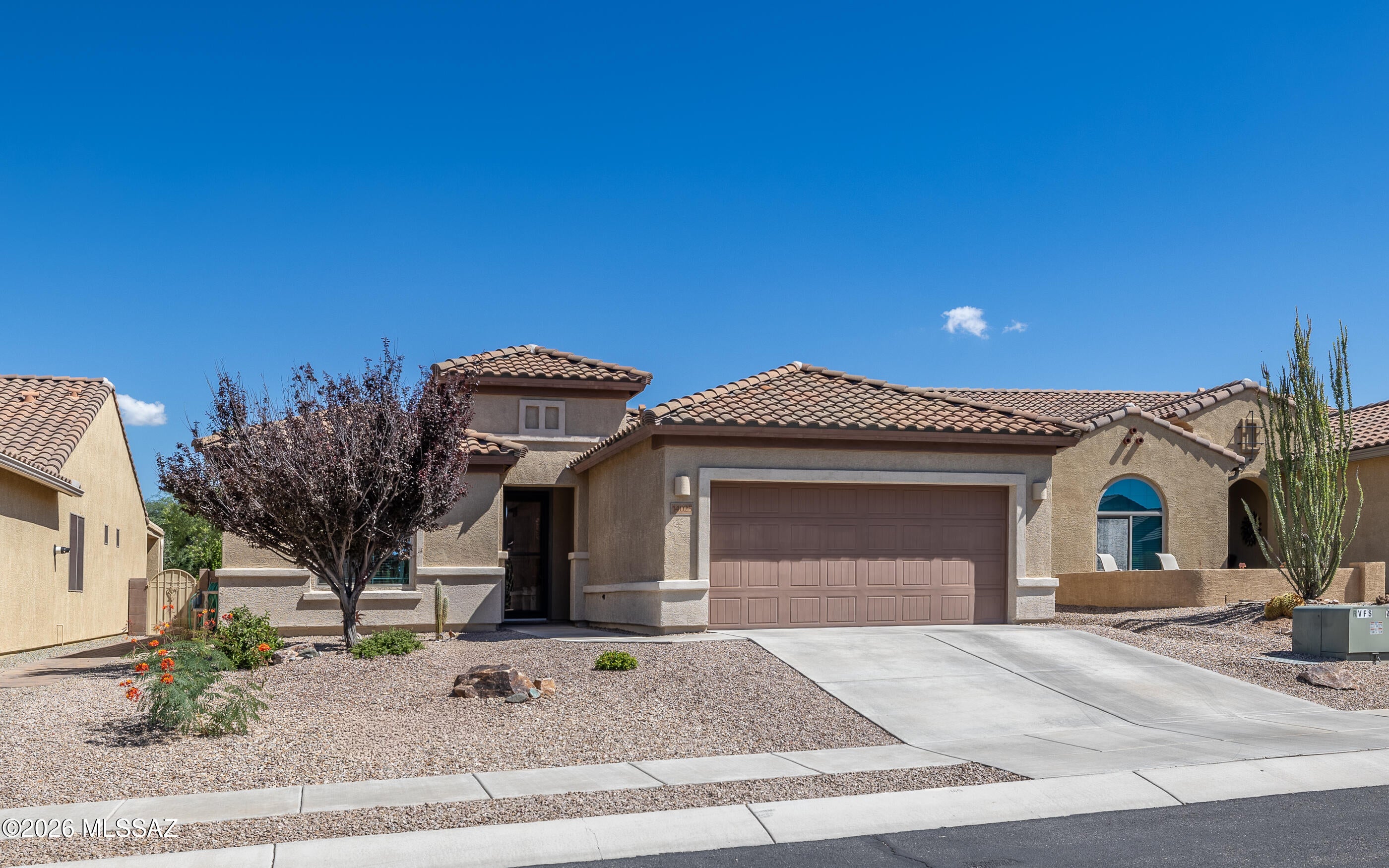 The Enchantment Model at Del Webb at Rancho Del Lago, a 55+ Active Adult Community known for its resort style amenities and welcoming atmosphere. This home is thoughtfully designed and offers comfort, elegance and easy living. Open Concept layout creates a natural flow between the living, dining and kitchen areas, feels spacious and inviting. Large windows and double sliding door brings abundance of natural light. This home offers 2 Bedrooms, 2-1/2 baths, Chefs kitchen, 3 Car Tandem Garage provides extra parking or storage. Del Webb is a gated community with Pickle Ball, Tennis, Putting Green, 2 Pools, Spa, Fitness Center, Activities for anyone to participate.