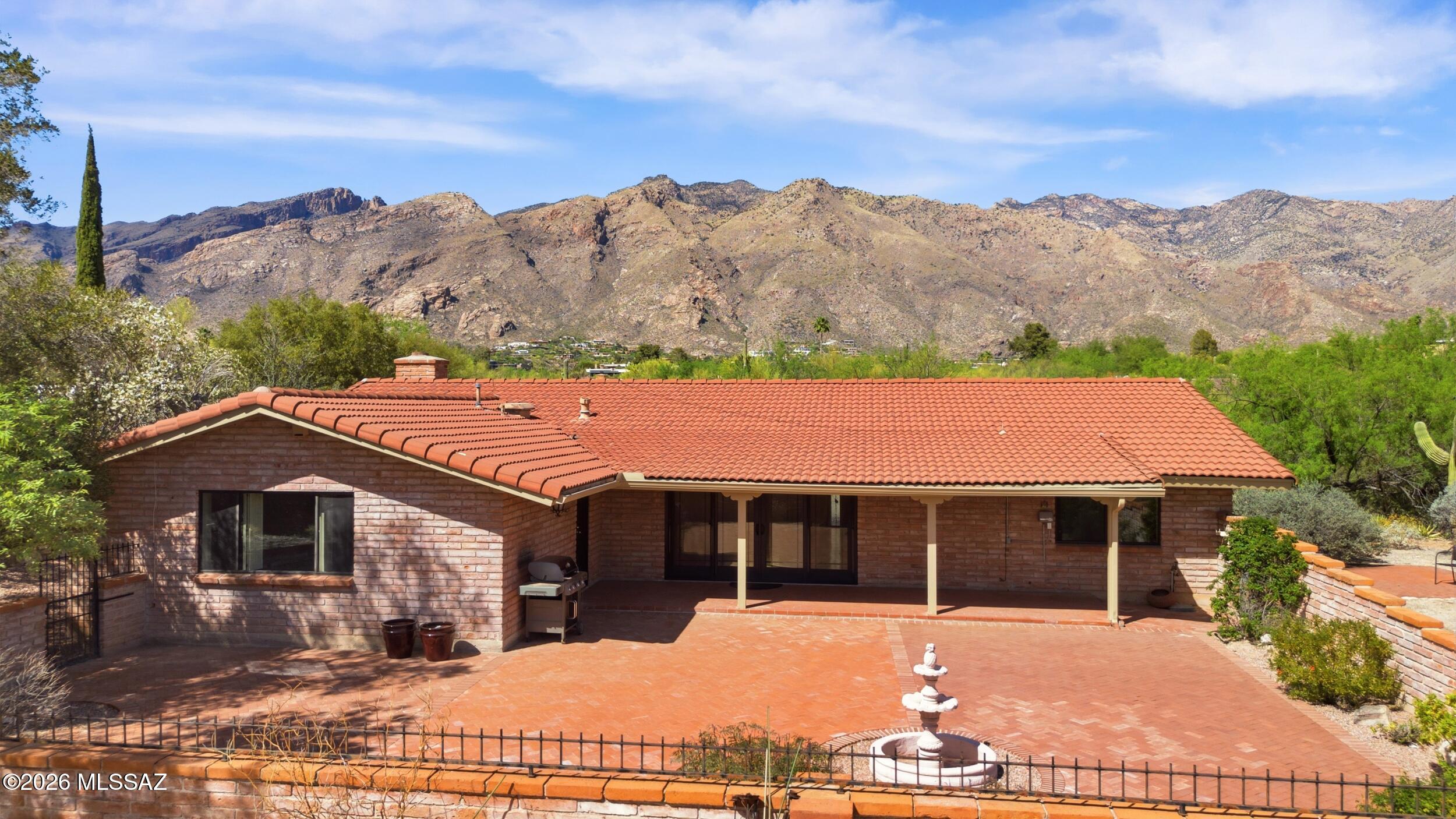 Within Skyline Bel Air Estates with City and Mountain views. Corner lot on a quiet cul-de-sac with mature vegetation and strong privacy. Open floor plan with scored concrete floors and neutral finishes. New kitchen with stainless steel appliances, granite counters, and soft-close cabinets. Updated bathrooms. Newer HVAC and water heater. Split bedroom floorplan. Large Master Bedroom. Outdoor area with extensive brickwork and space for a pool. Mission tile roof. CFSD Schools. Neighborhood features a community pool and tennis courts.