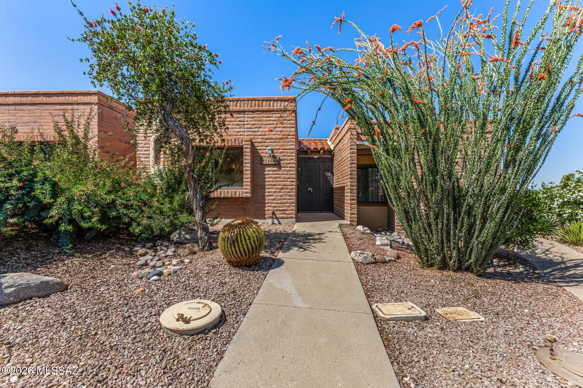 Welcome to this quite and well maintained community of La Cholla Hills. Open and bright with great space. Nice kitchen with plenty of cabinetry, pantry, and a pass-through with a breakfast bar. Both bedrooms are nicely sized with good closet space. Enjoy the back patio offering privacy with common area, no neighbors and views of the distant mountains. The community offers amenities such as shuffleboard, tennis courts, pool and spa and a recreation center. Close to shopping and restaurants. 55+ age restricted community.