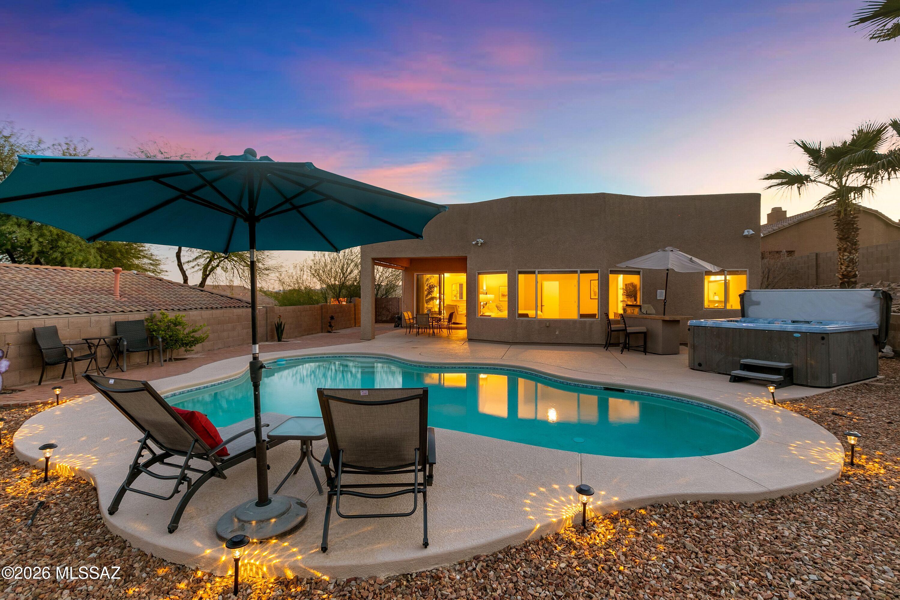 Where to begin?  Fantastic Catalina Mountain views from the backyard. pool and hot tub.  Huge elevated lot backing to private area.
Fully furnished (with the exception of the Living Room set).  New beds, just installed brand new hvac, as well as new roof last year.   Newer pool heater too.
Home is used as a second home for the owners and VRBO style vacation home for income. Adding to the convenience and value, the home is being sold fully furnished with quality furnishings throughout, including a new genuine leather living room set and real wood beds--making it easy to move right in and immediately enjoy the home. Major improvements provide added peace of mind, including a completely new HVAC system with new A/C and furnace in 2026, a new roof coating in 2025, and fresh exterior paint in 2024. Located less than 10 minutes from multiple golf courses, hiking and biking trails, restaurants, shopping, and entertainment,