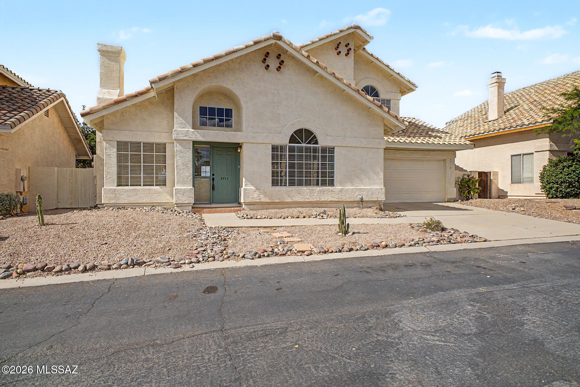 New Listing Alert! Beautifully updated home in coveted Northwest Tucson, ideally located within walking distance to award-winning Marana schools. Features include luxury plank flooring, plush carpet in bedrooms, modern electrical and plumbing fixtures, updated door hardware, Quartz countertops, refinished cabinetry, fresh interior paint, and stainless steel appliances. The primary bath showcases stylish tile shower surrounds. Enjoy the sparkling community pool.  Move-in ready and a must see!