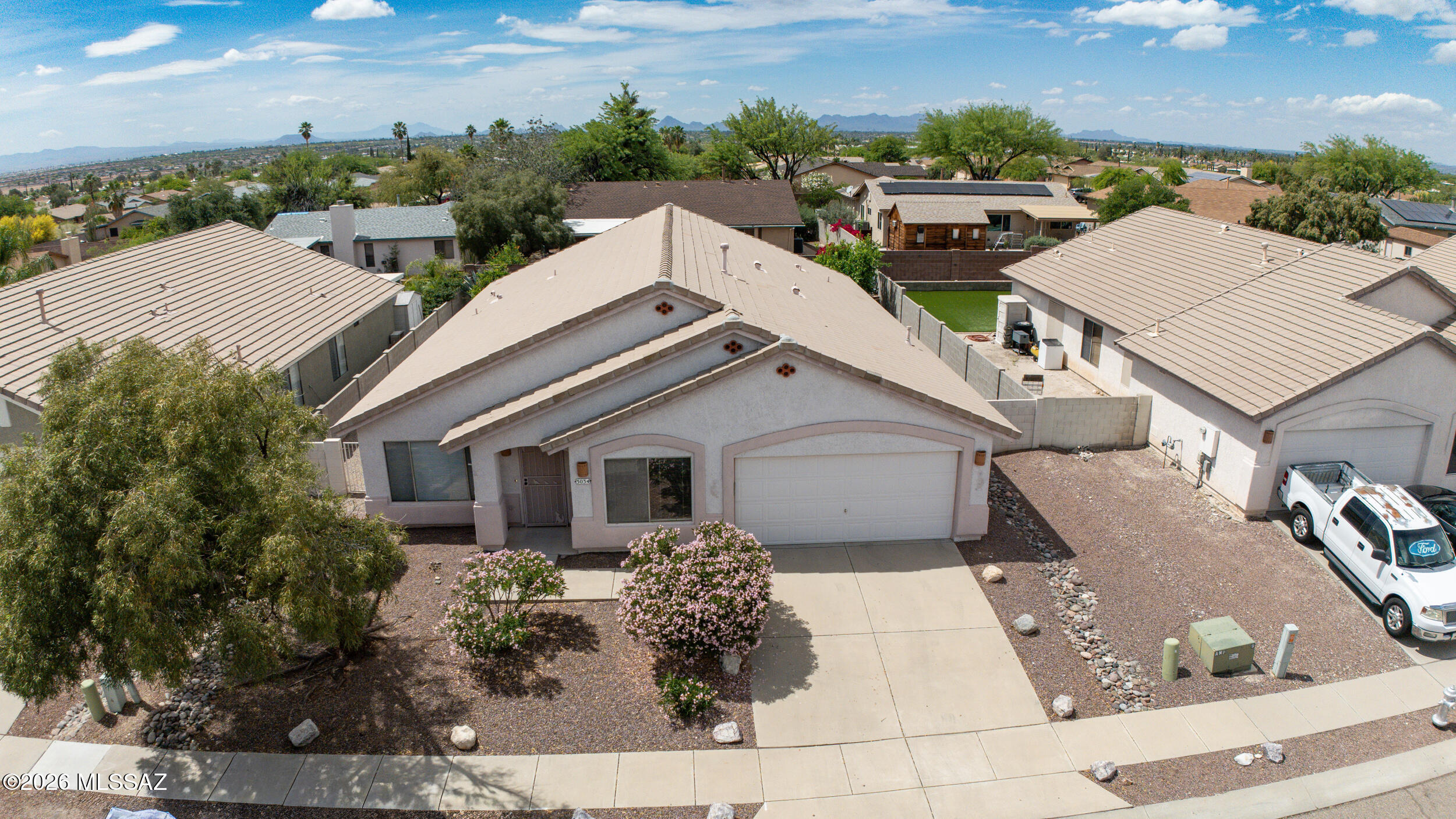 Seller will accept/counter offers between $375k-$400k. Bright and spacious 4bed + Den/2 bath home with split bedroom floorplan. Spacious kitchen with quartz counter tops with all appliances included. (Gas option for range available). Large primary suite with double vanity, separate shower/soaking tub, quartz counter tops and walk in closet. Newer paint and Front/Rear wrought iron security doors. Ceiling fans in every room. Extended full length covered patio. Spacious yard with citrus trees. One owner home ready for the new owner! Must see!