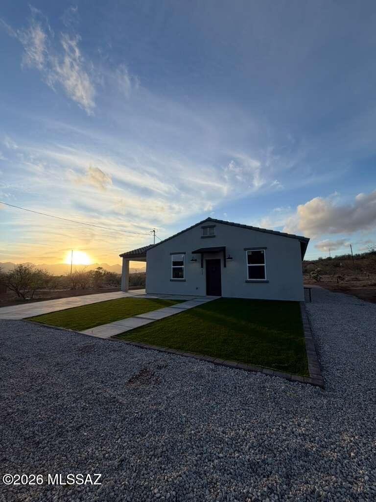 Welcome to your dream home in beautiful Rio Rico! This brand-new construction offers 3 spacious bedrooms and 2 modern bathrooms, thoughtfully designed with comfort and style in mind.
 Open-concept living area
 Beautiful kitchen with contemporary finishes
 Private primary suite with en-suite bath
 Energy-efficient features
 Breathtaking mountain views right from your backyard
Enjoy peaceful desert living while still being conveniently located near local amenities and just a short drive to Nogales.
Don't miss the opportunity to own a brand-new home with incredible views in one of Southern Arizona's most scenic communities!
 Schedule your showing today! 520-841-2271.