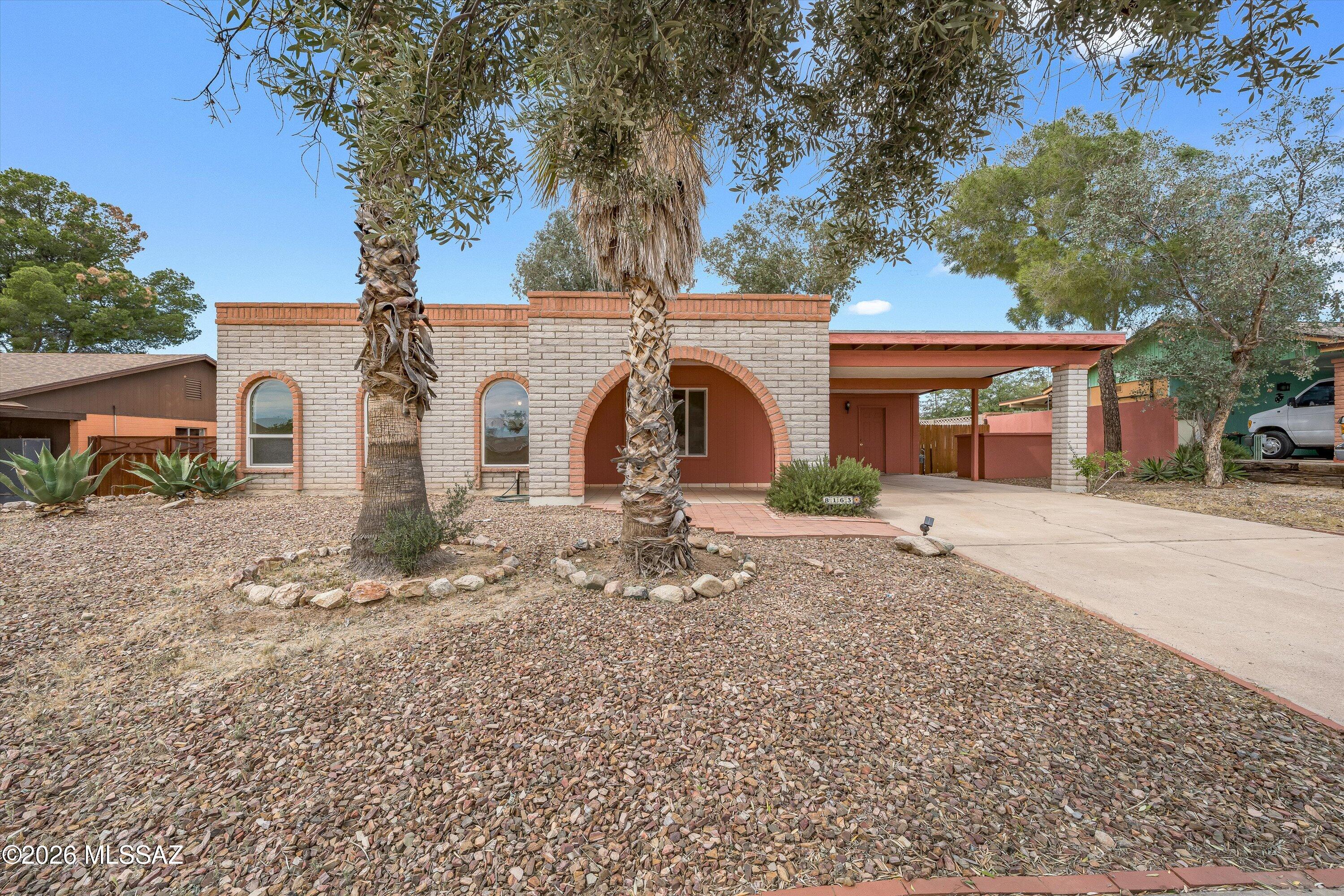 Location, location! This home is in a desirable Northwest Tucson. Situated in an established neighborhood near Thornydale and Cortaro with convenient access to I-10, shopping, dining, and everyday essentials. Large living room with Beehive fireplace, Open Kitchen, separate family room, laminate flooring, oversized bedrooms, covered patio, nice yard with plenty of room for entertaining.