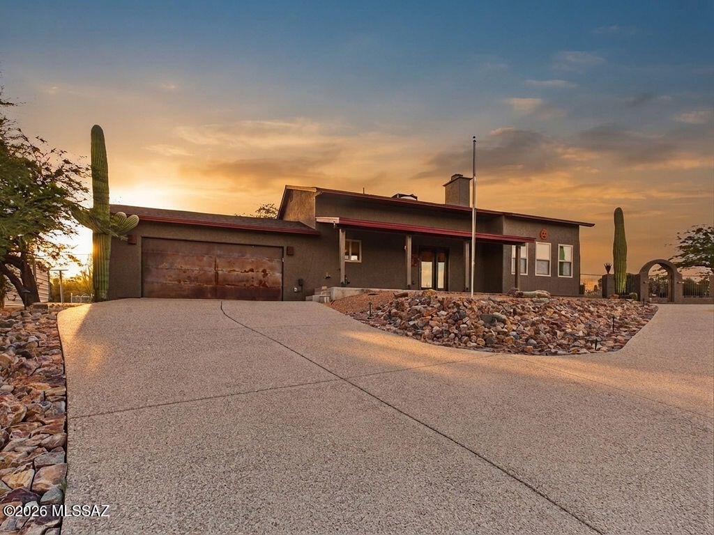 HILLTOP HOME WITH COMMANDING CITY & MOUNTAIN VIEWS! Enjoy spectacular views from the living room, separate family room, kitchen, and dining area on this private acre lot. Vaulted ceilings, open floor plan, Saltillo tile, built-in computer/study area with skylight, private pool, dramatic lighted driveway, and wrought-iron security features add to the appeal. Extensively improved from 2022-2026: New HVAC (2022); new roof, all windows, main-house exterior doors, and exterior paint (2023); pool replaster with a cool deck refinish, and new programmable pool pump (2024); new front porch roof structure, living room wood flooring updates, remodeled primary bathroom, and updated carpeting & tile flooring throughout (2025-2026); concrete driveway lining, landscape riprap & lighting, interior paint throughout, and backyard chain-link fencing upgrades (2026). A unique hilltop property with major improvements already completed and incredible views to enjoy!