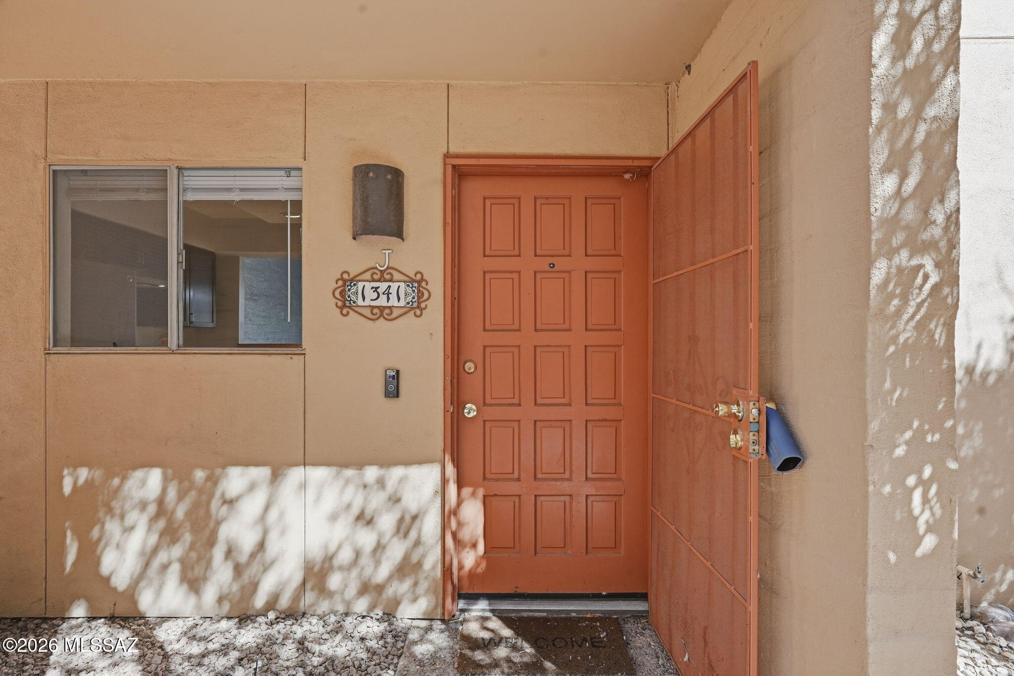 Approximately 2 miles north of the University of Arizona, this refreshed 2-bedroom condo offers comfortable low maintenance living with easy access to everyday amenities. This ground-level unit features a designated covered parking space and a private back patio with gated access to the rear alley. Nearby residential streets and neighborhoods provide plenty of options for getting outside for a walk, or taking the dog for a stroll. Enjoy the community pool, complete with BBQ areas, tables, and seating for outdoor gatherings. shopping, dining, bike lanes, bus routes, and the university are all nearby, king it easy to enjoy everything central Tucson has to offer. Whether you're looking for a primary residence, seasonal getaway, or Tucson home base, this move-in-ready condo is worth a look.
