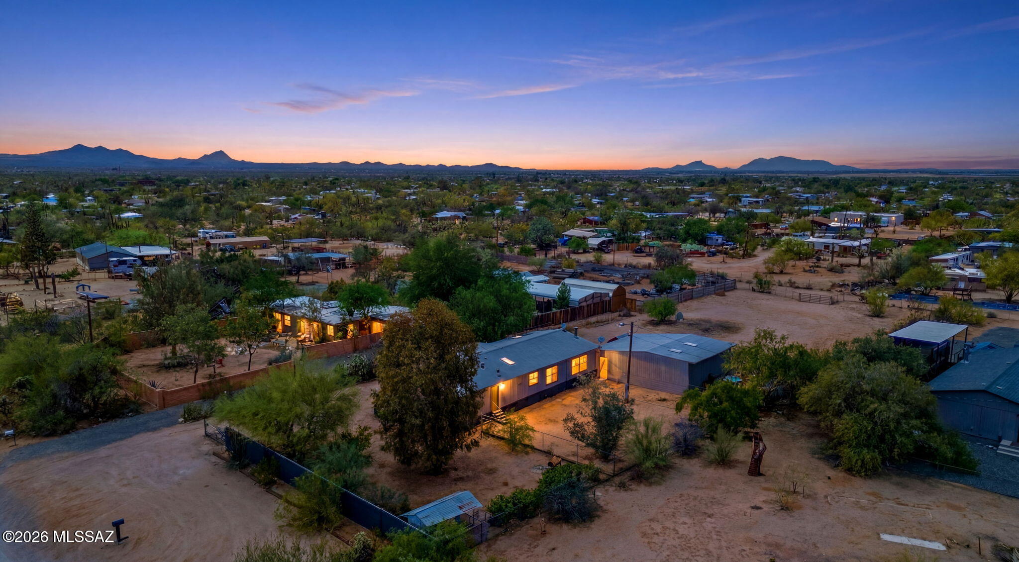 MOTIVATED SELLER! SOLD AS-IS! Bring your vision and unlock the potential of this desert property on a full acre in the beautiful Sonoran Desert. This 3-bedroom, 2-bath home features a spacious living room, separate family room with fireplace, and a 3-car garage with two separate bays. The fenced yard includes a chicken coop, plus plenty of room for RVs, boats, trailers, and toys. Recent upgrades include a reverse osmosis system, water softener, new furnace, new water heater, new A/C, and new stove. With a little TLC and updating, this property could truly shine. Conveniently located near Saguaro National Park, offering space, privacy, and endless possibilities. MOTIVATED SELLER! SOLD AS-IS! Bring your vision and make this desert property your own. Situated on a full acre in the heart of the Sonoran Desert, this 3-bedroom, 2-bathroom home offers space, privacy, and endless potential. Inside, you'll find both a spacious living room and a separate family room with a cozy fireplace, creating plenty of room for everyday living and entertaining.

The three-car garage features two separate bays, while the expansive lot provides additional parking for your RV, boat, trailers, and other recreational toys. The fenced yard includes a chicken coop and ample space for gardening, animals, or creating your dream outdoor retreat.

Several major upgrades have already been completed, including a reverse osmosis water system, water softener, new furnace, new water heater, new A/C unit, and new stove. With a little TLC and updating, this property could truly shine.

Conveniently located near the stunning landscapes of Saguaro National Park, this is an excellent opportunity for investors, hobby farmers, outdoor enthusiasts, or anyone looking to enjoy the beauty and tranquility of Arizona desert living. Seller is highly motivated--don't miss your chance to unlock the potential of this unique property!