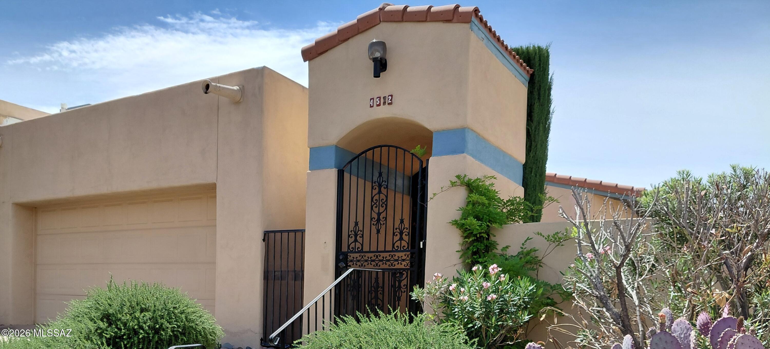 Charming Patio Home in gated Kachina Hills w/ vaulted ceilings, corner fireplace and design charm in living area. Kitchen features mountain views from bay window in dining nook. Gated entry courtyard w/room to grill and seating area to enjoy the mountain views. Patio continues to the south patio which faces open area between homes. Custom hand carved wood window valances stay!  New roof and AC in 2025. Being SOLD AS IS.