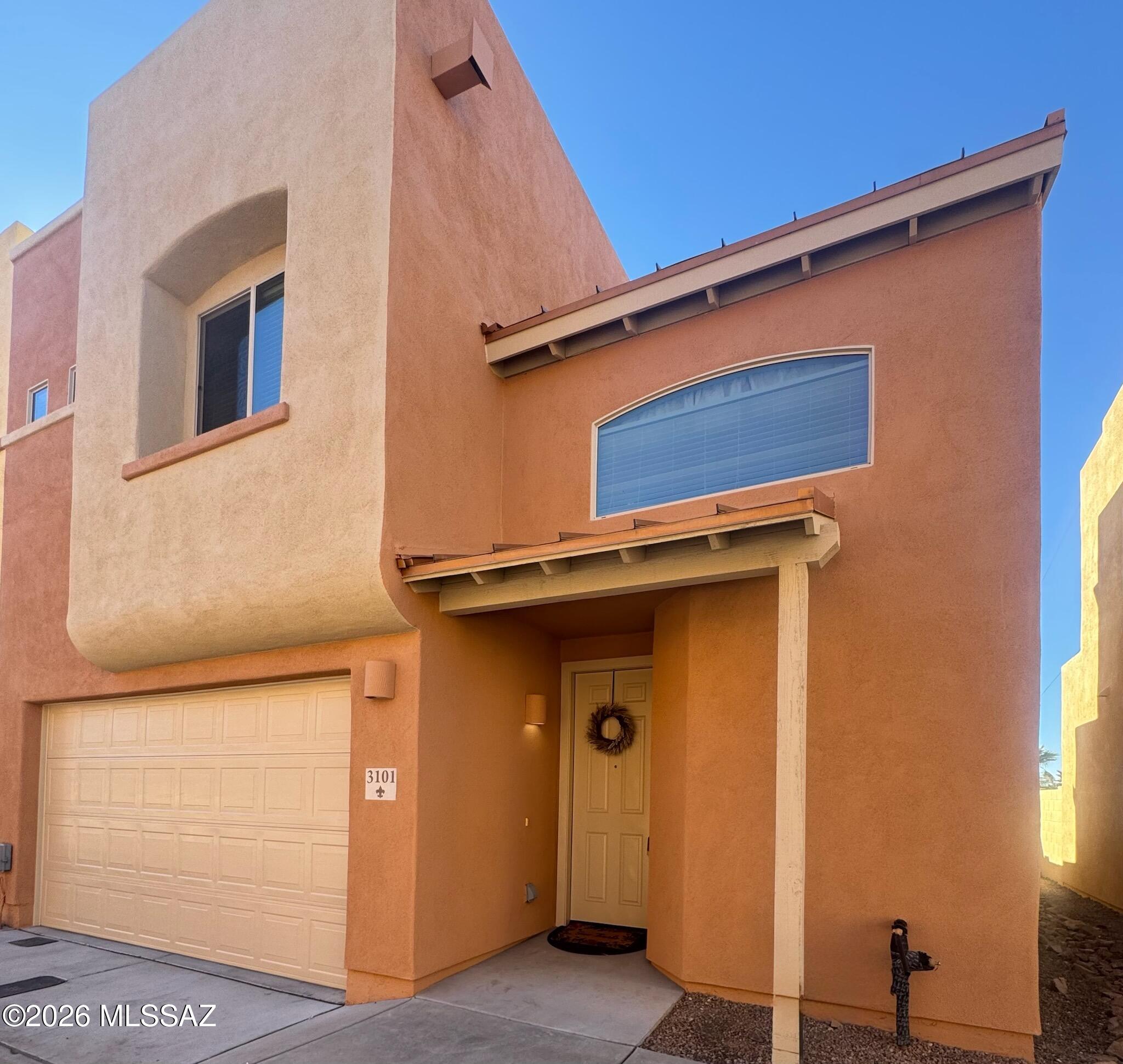 QUICK MOVE IN! Stunning Central Gated Community, 3BR, 2.5 Baths Lg 2 Car Garage and Over 1500 sqft. 
 FURNITURE INCLUDED! Contemporary 2 Story floorplan, has Granite Counters, 18'' tile floorso on first floor, Pantry, Center Island,  Open & Light. Good investment opportunity, Washer & Dryer included. 14 Condos On third street bicycle path, great central location close to UofA, downtown, shopping medical, etc. Spacious 2 Car Garage. Open views with palm trees and mountain tops. Good lot location and one side is not attached. Guest parking at rear end of street. Low E Dual Pane Windows. A Great place to call Home! MUST SEE!