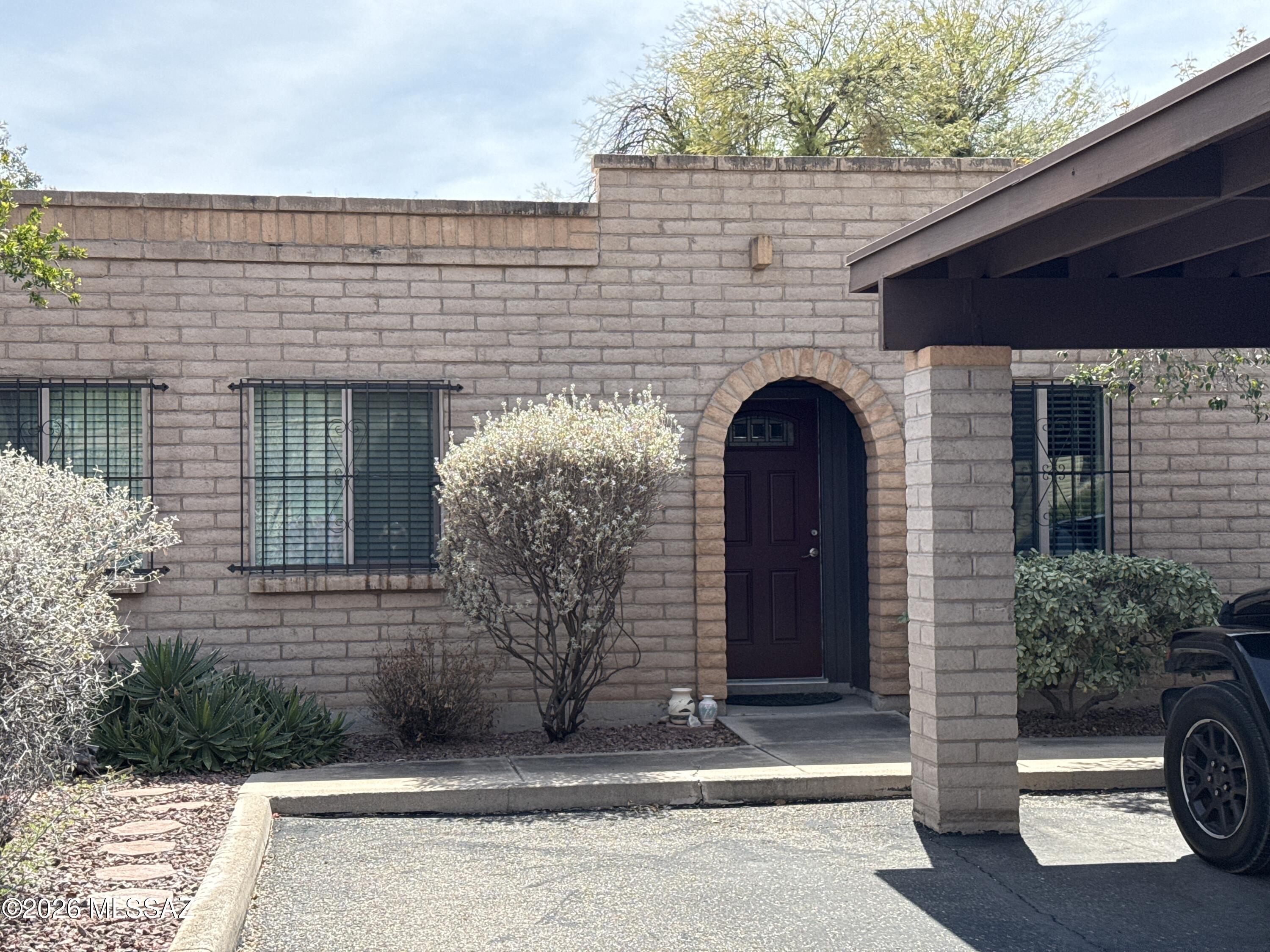2 Bedroom 2 Bath Townhome. Water Included. Kitchen with all appliances, large living room opens to patio. Primary Bedroom with in-suite bathroom. 2nd Bathroom access off inner hallway. Laundry washer and dryer included in unit laundry storage. Central AC..  All vinyl plank flooring.  Covered carport space at front door. Community Pool!