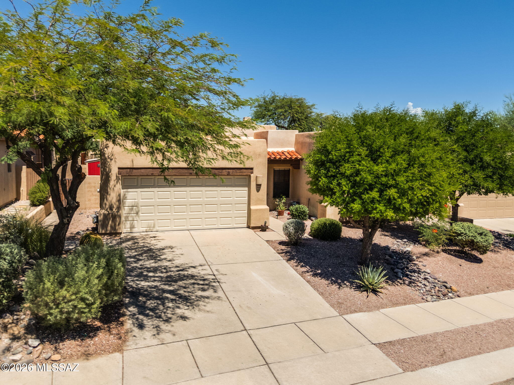 RECENTLY REMODELED & MOVE-IN READY in the desirable Starr Pass area! This beautiful home offers a split-bedroom floor plan with a spacious primary suite featuring dual vanities, granite counters, oversized walk-in shower & 2 closets. Guest bedroom plus den/optional 3rd bedroom & full guest bath. The open living/dining area. Step outside to a beautiful, private backyard retreat with sparkling pool, covered patio & built-in grill--perfect for relaxing or entertaining. Enjoy a private neighborhood setting just minutes from Starr Pass Resort & Golf Club, hiking & biking trails, Downtown Tucson, Mercado San Agustín, MSA Annex, restaurants, shopping & I-10.