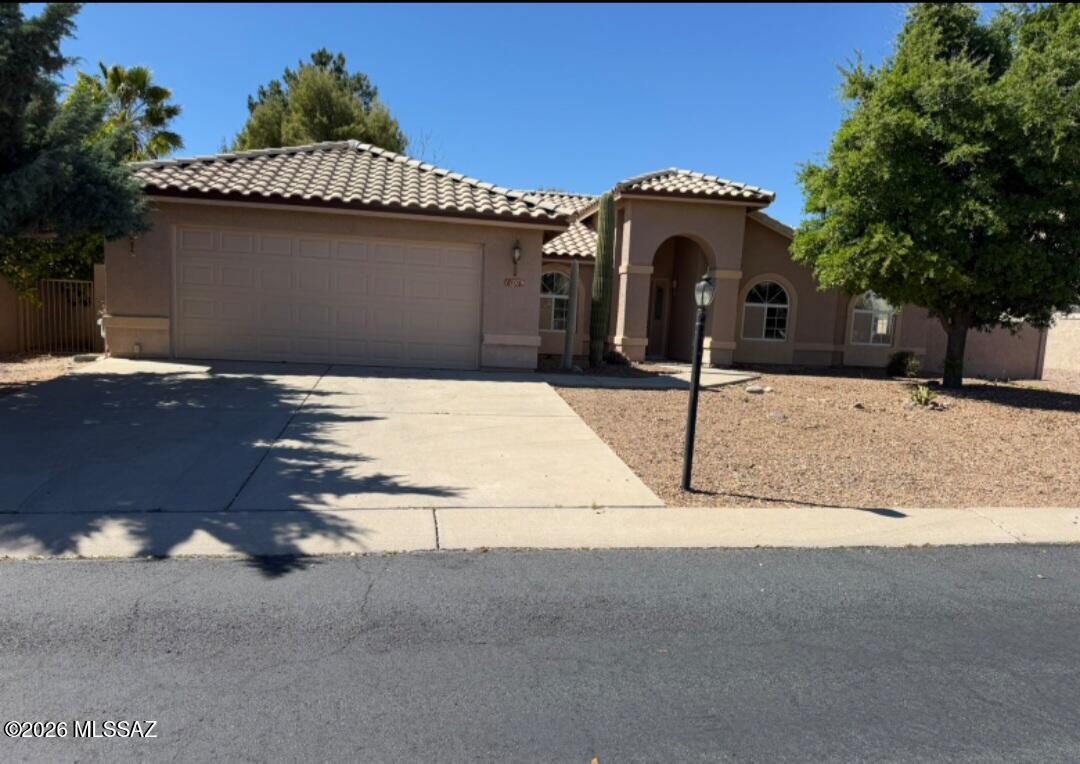 Very nice home in sought after Canada Hills community. Open floorplan w/ 3 bedrooms (split plan). Vaulted ceilings. Tile floors in entry, kitchen, baths, & laundry. Formal LR w/ separate formal dining. The second bath has rear yard access; New roof, new plumbing throughout whole house. Garage door was just replaced 8 months ago. You will not want to miss this great deal.