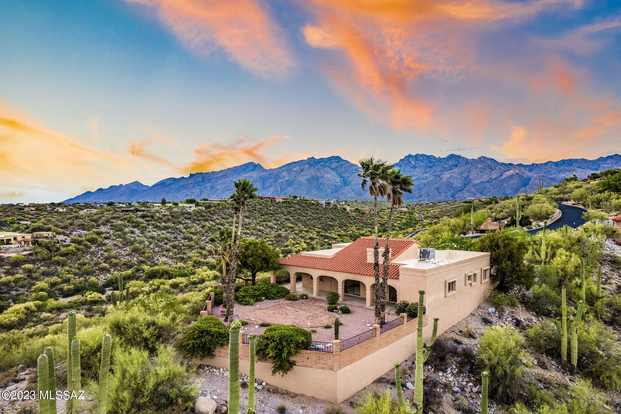 BREATHTAKING PANORAMIC VIEWS of the city & mountains from this foothills home. 1st time on the market! It has a prime location at the end of a cul-de-sac, nestled on a bluff, offering sweeping vistas. The wraparound porch offers ample space for outdoor seating, dining, & relaxation, with views everywhere you look. Whether you envision yourself entertaining friends and family in style, or simply savoring the peacefulness of your natural surroundings, this porch has been thoughtfully designed to accommodate your every desire. Although the interior may require some updates, this home offers a rare chance to customize & transform it into a modern, stylish haven. With some creativity and vision, this property has the potential to become the envy of the neighborhood! Make it yours today!