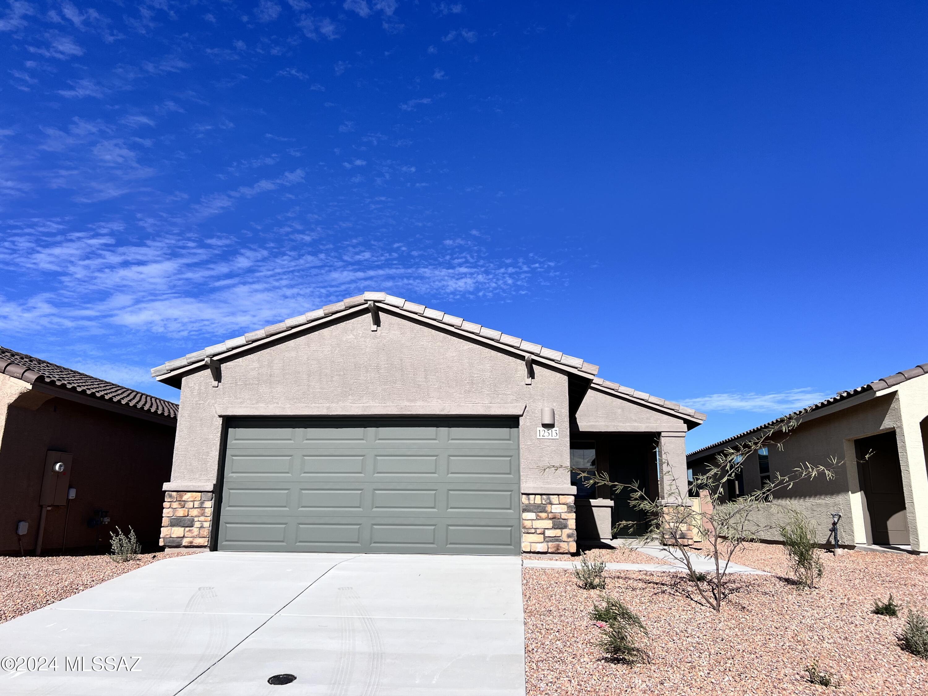 Beautiful brand new 3bdr/2ba /den home in Vail! The kitchen features granite counters, a gas stove, a large island, walk-in pantry, pendant lighting, and white cabinets. Split bedroom floorplan, ceiling fans, fenced backyard w/covered patio. Primary bedroom w/ensuite offers dual vanity, shower and walk-in closet. Tenant occupied until 03/31/2026