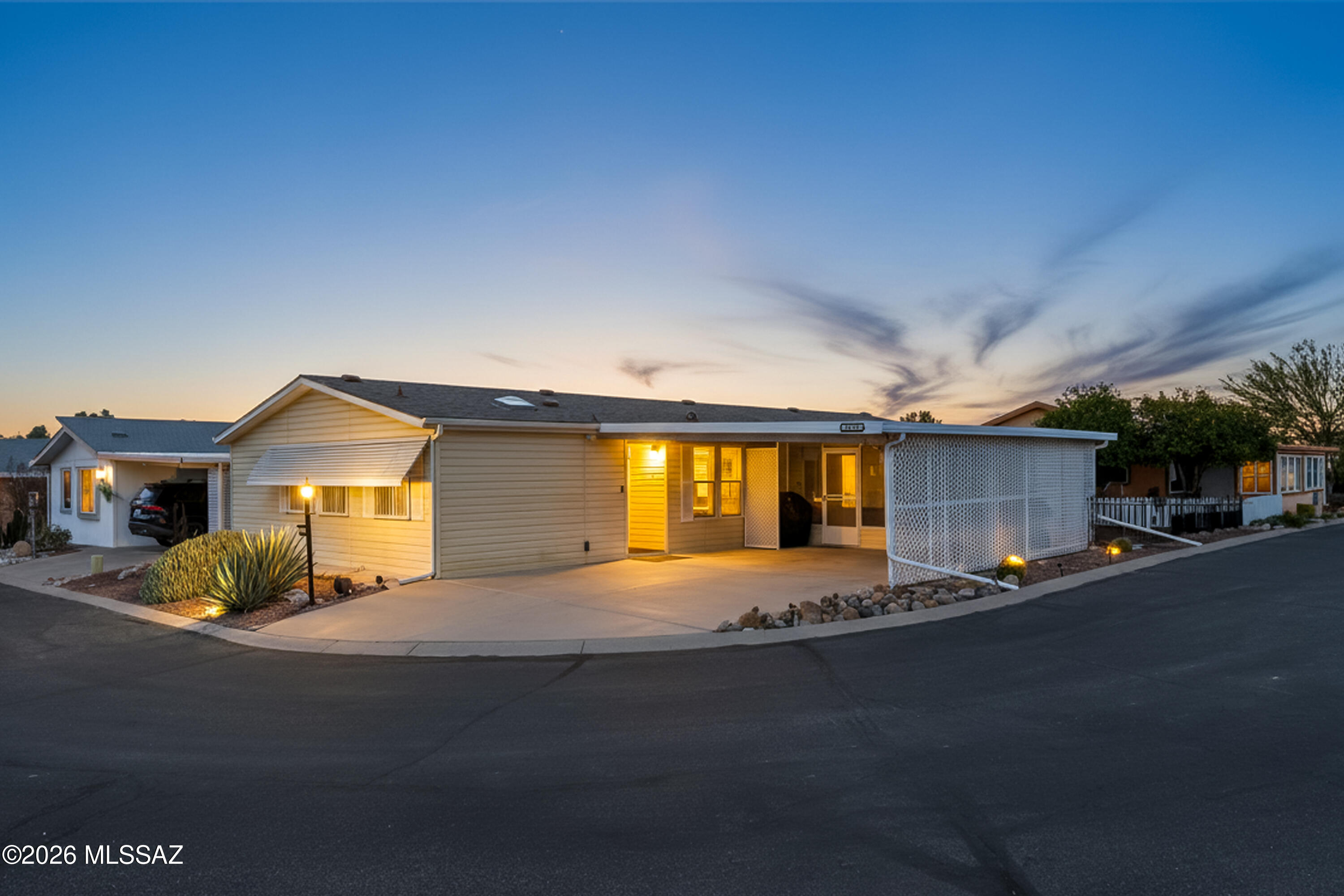You own the land! Discover the perfect blend of comfort, convenience, and community in this very well maintained home in Copper Crest, a gated community with so many amenities and low HOA! Ideally situated on a desirable corner lot with ample parking, & designed for easy living, this home features a newer roof with transferable warranty, a newer HVAC system with a PAID AND TRANSFERABLE bi-annual maintenance plan for 10 YEARS! Newer water heater, and transferable termite warranty! Step inside to find a bright & inviting split-bedroom floor plan, enhanced by plantation shutters on most windows and an abundance of natural light. The spacious kitchen features modern slate appliances, great storage, and a seamless flow into the dining and living areas. The generously sized Arizona room is perfect for relaxing or entertaining year-round. Huge primary suite easily accommodates a King size bed with plenty of room to spare, including a large walk in closet. Floor plan available. Golf cart negotiable.