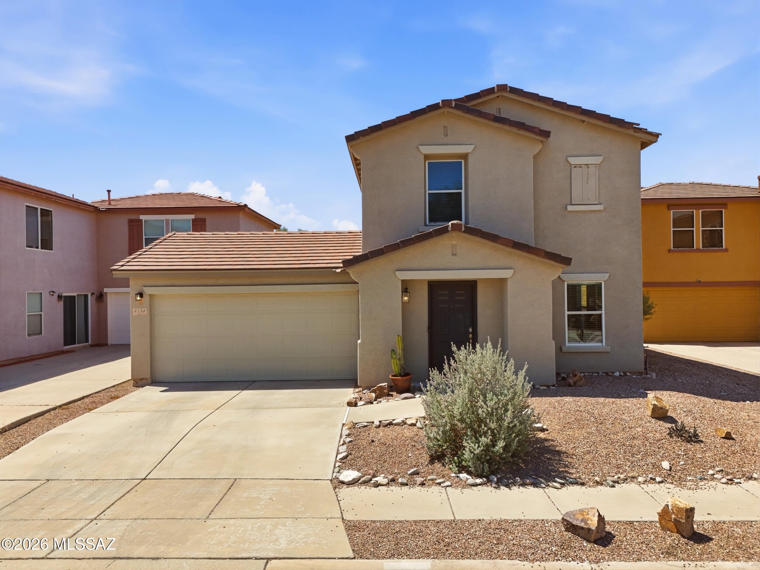 Welcome to this beautifully updated two-story home in the desirable Riverhaven community, located in the heart of Tucson with no rear neighbors for added privacy. Featuring 3 bedrooms, 2.5 bathrooms, and 1,681 sq. ft., this move-in ready home offers a bright, open floor plan featuring porcelain flooring, soaring ceilings, and abundant natural light. The updated kitchen showcases granite countertops, stainless steel appliances, white cabinetry, a pantry, and breakfast bar seating. Upstairs, the spacious primary suite includes a walk-in closet and ensuite bath. Enjoy a low-maintenance backyard, 2-car garage, and a central location close to shopping, dining, parks, the University of Arizona, and Davis-Monthan AFB.