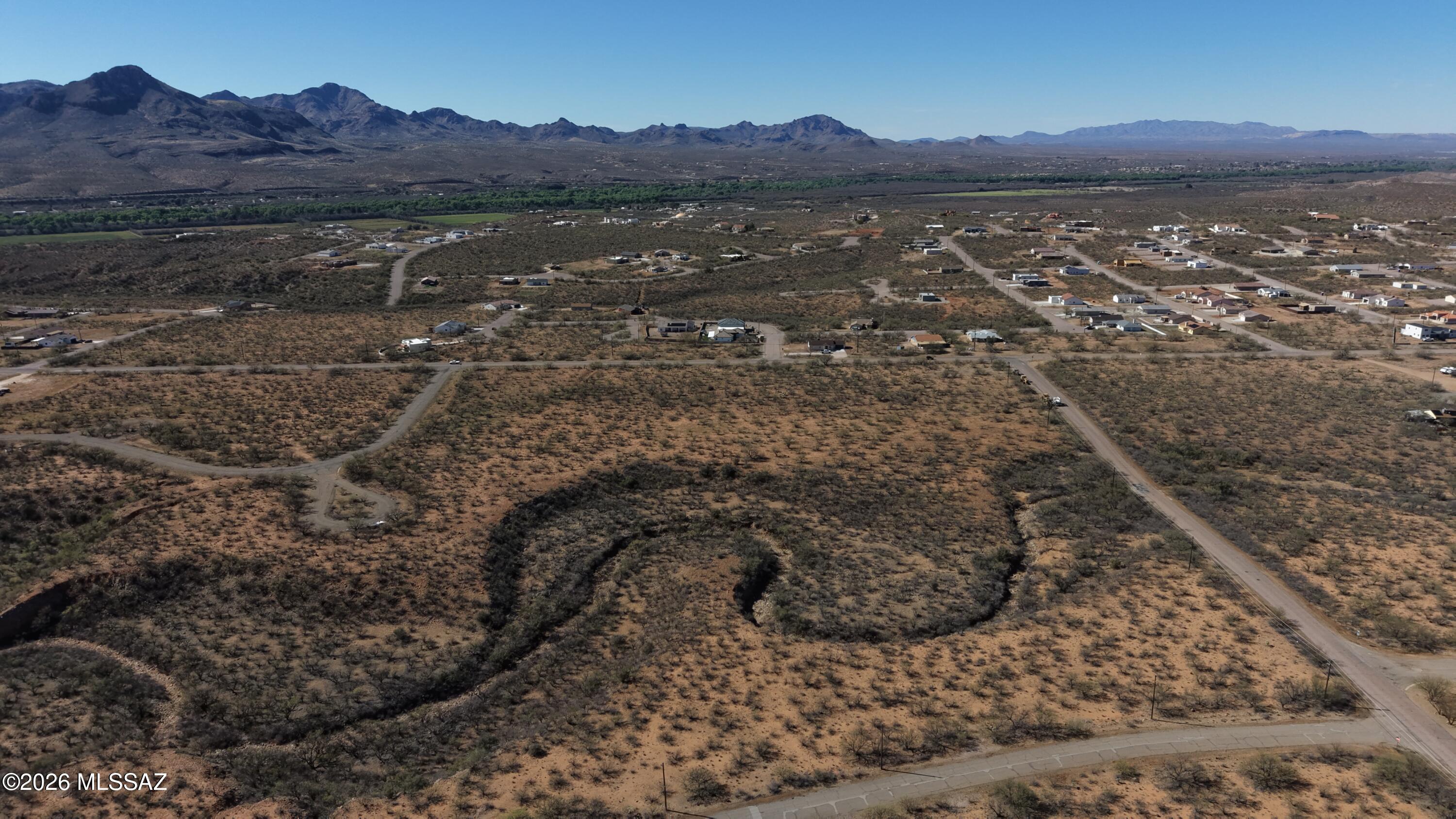 17.40 Acres, 2 total lots, sold together in, in Rio Rico's fastest growing area. Zoned B1 for the small businesses to move in. You can live and work from home with this zoning. See attached Santa Cruz county zoning code for all of the many options, including neighborhood market, bakery, church, feed store or even a dispensary! You can split these 2 lots into smaller lots if you don't need it all! Electric and water is at the lot line. Both tax codes are 137-02-421 & 137-02-006