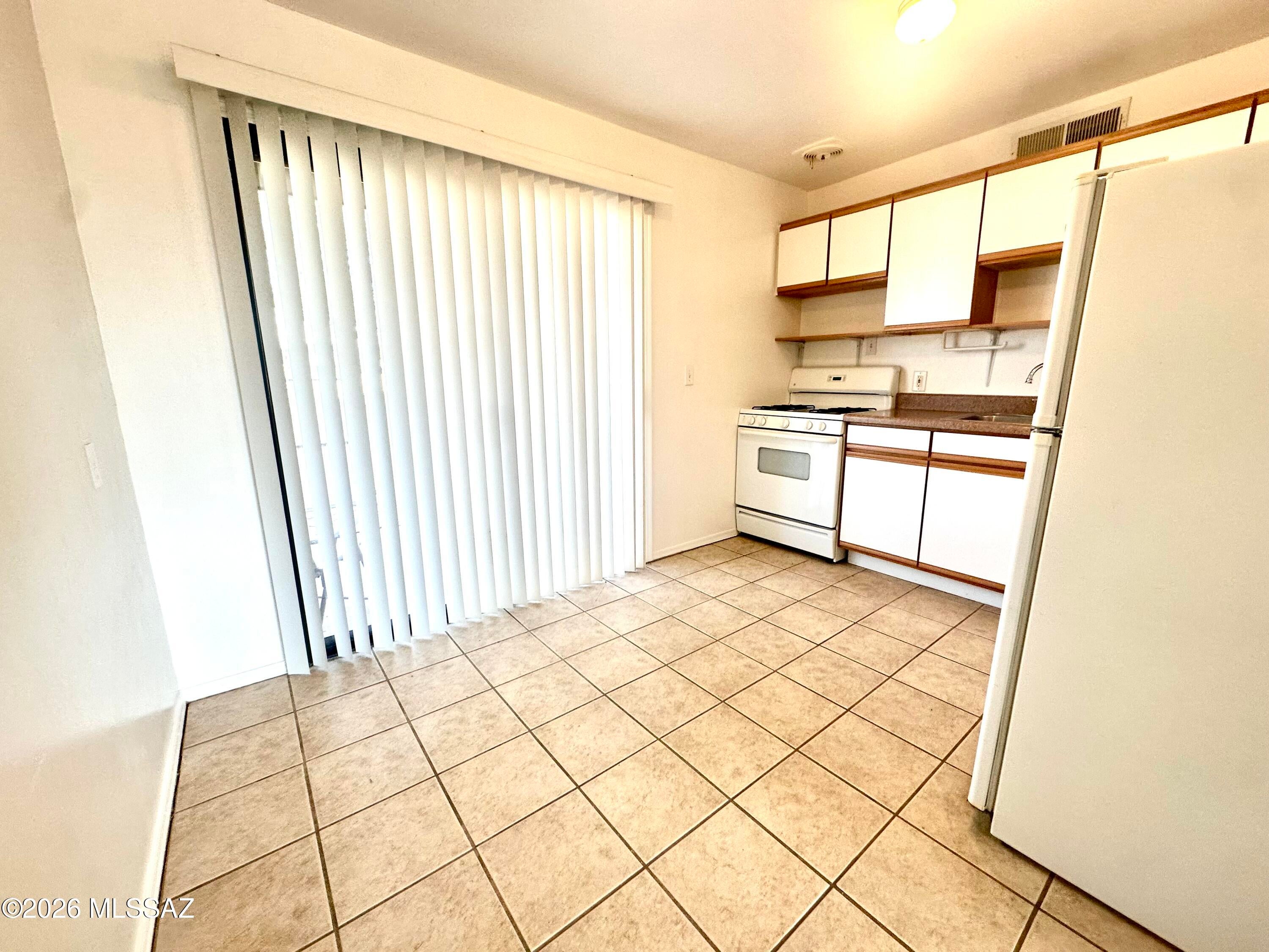 Sunset Foothills Condos (1-201) - Residential Lease