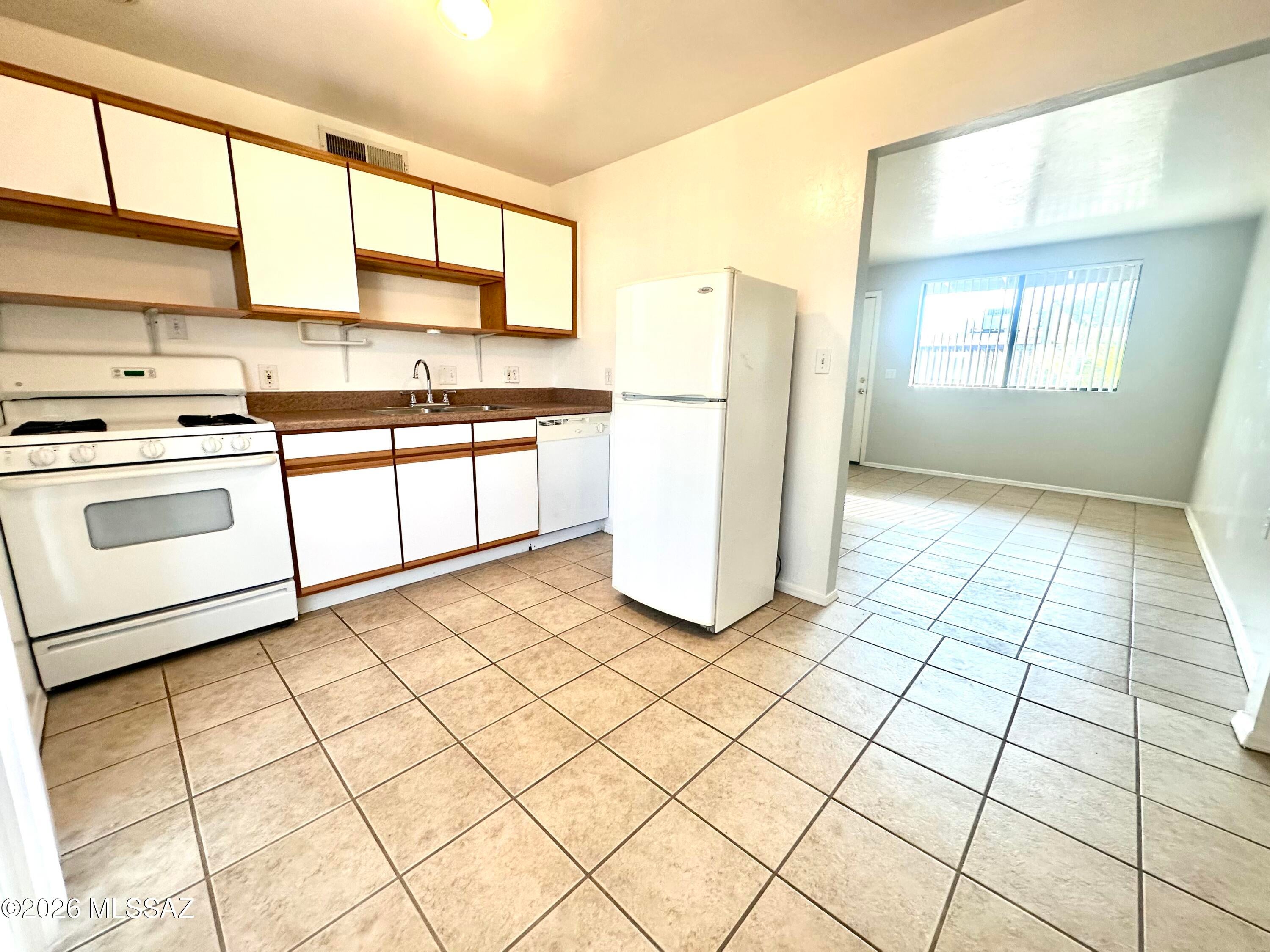 Sunset Foothills Condos (1-201) - Residential Lease
