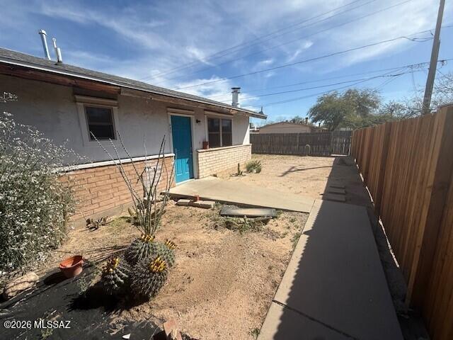 This pet friendly, 2 bedroom, 1 bath duplex is set in the back offering you peaceful privacy. The fenced yard is large enough to kick back and relax or have a barbecue while allowing room for kids and pets to play. The interior has been recently remodeled. There is an eat-in kitchen with plenty of storage and a living room with a fireplace. A carport for one car also has a storage room with W&D hookups. A new furnace and AC will give you low cost, worry free comfort.