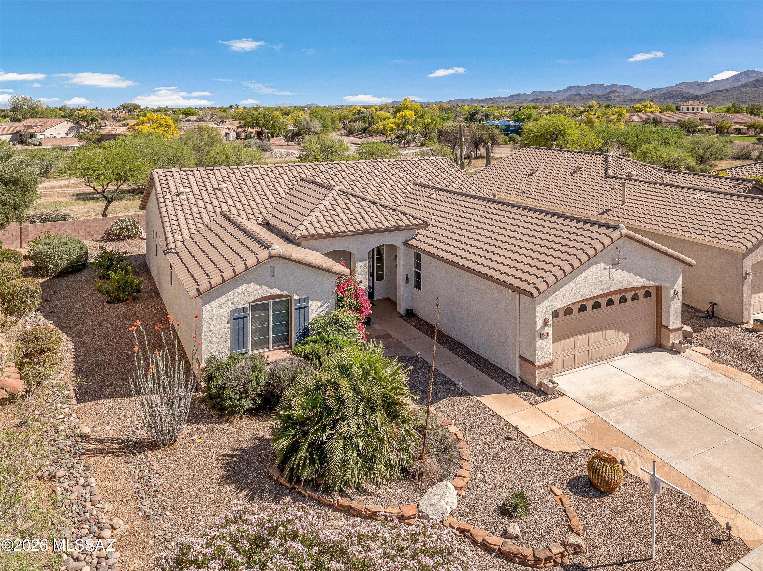 Enjoy great views from this well-positioned home in the desirable Continental Ranch Sunflower 55+ community! This home has new tile-look laminate flooring throughout, and comes with a flex-space hobby room, & formal living & dining area that opens up to the back, covered patio where hours can be spent enjoying the soothing sounds of the plumbed fountain, mature landscape & views! The kitchen looks onto a pleasant family space w/breakfast area & large niche for your humongous TV! The master suite has a bay window, zero-clearance shower, walk-in closet, dual sinks & private toilet room w/window! The two-car garage has fresh white paint & comes w/a wall of storage cupboards. A pet-friendly community w/many clubs & activities for an active adult lifestyle! Close to shopping, restaurants & I-10