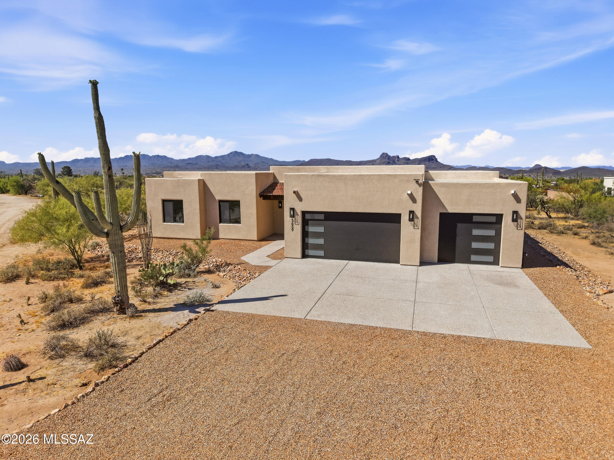 Brand-new construction built for the way you actually live. This home sits on an expansive lot with thoughtful spacing, just minutes from I-10, Dove Mountain, shopping, and dining--privacy and convenience in one package.
Got toys? The oversized 3-car garage was made for trucks, gear, and weekend escapes. Step inside to a light-filled great room designed for gathering and everyday living, with quality finishes and craftsmanship throughout.
The split-bedroom floor plan tucks a private guest suite away from the primary--perfect for visitors, multigenerational living, or a quiet home office.
This isn't just a house. It's a place built to fit your life, your gear, and your people.