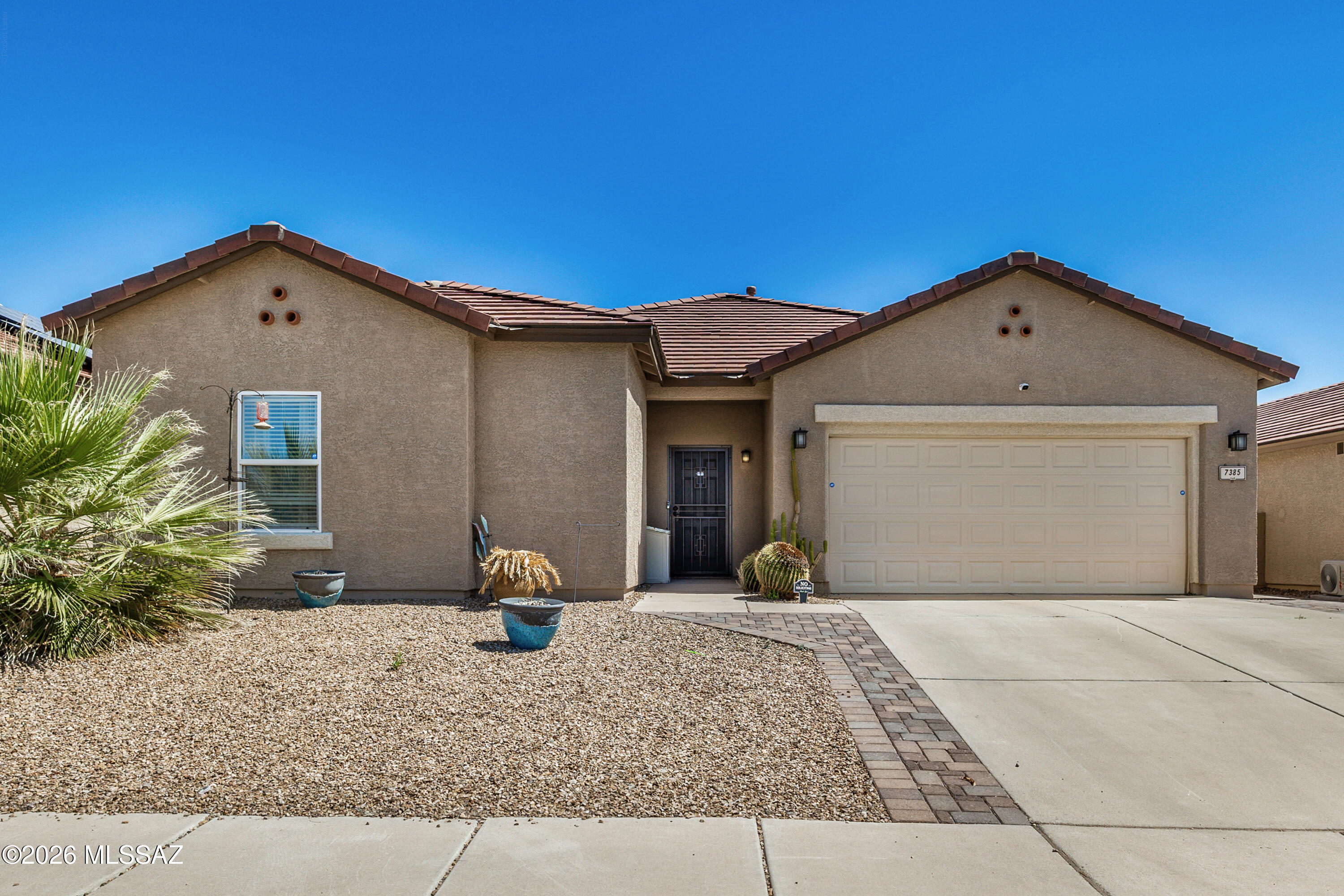 Nestled in the desirable Rita Ranch community of Tucson, this beautifully maintained 3bd/2ba home offers over 2,400 sq ft of comfort and style. Designed with a split floor plan and two expansive living areas, the open-concept layout creates the perfect balance of connection and privacy. The additional living space is incredibly versatile- ideal for a playroom, home office, bonus room, or all of the above.

The heart of the home features updated kitchen, primary bath and water softener. Step outside to your private retreat with a true outdoor oasis with a charming cantina, a gazebo-covered therapeutic hot tub, perfect for entertaining. Newer roof, ac units, exterior paint, and more. 

Located in the award-winning Vail School District, near Davis Monthan AFB, this home will not last long