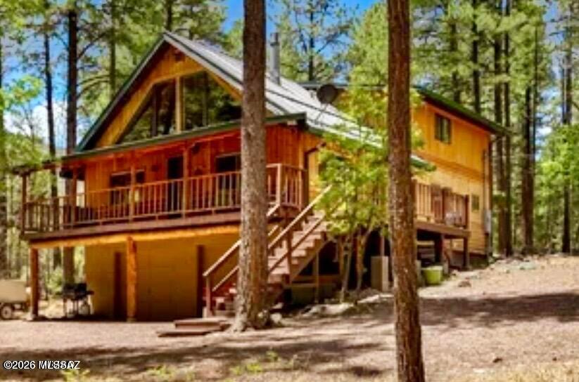 Rare 5-bedroom, 3-bath mountain cabin on 1.74 acres backing the National Forest in the highly sought-after Alpine Highlands
subdivision. Tucked away among tall pines, this spacious cabin retreat offers privacy, direct access into the forest, and the perfect
setting to enjoy everything Alpine has to offer.