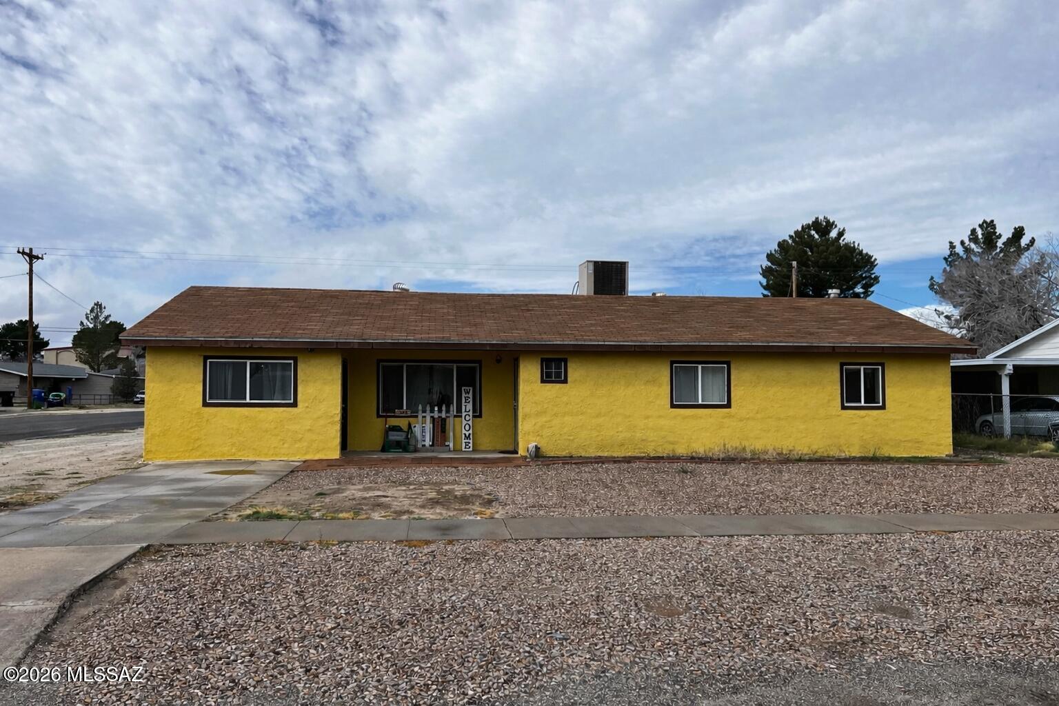 Spacious 3 bedroom, 2 bathroom home offering a versatile floor plan in a convenient central Willcox location. This property features both a living room and a separate family room, providing multiple options for everyday living and entertaining. The kitchen includes a large butler pantry with extensive storage and prep space. A dedicated office with its own private exterior entry adds exceptional flexibility--ideal for remote work, client visits, or a home-based business. The property sits on a generous lot with ample outdoor space for gardening, recreation, or future improvements. Located close to schools, shopping, and downtown amenities.