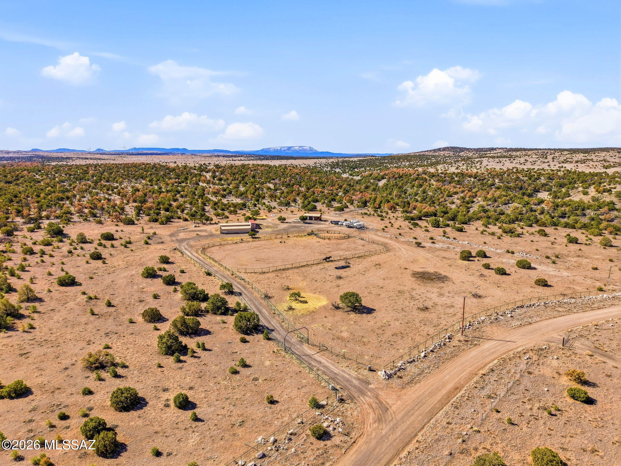 HORSE RANCH IN CATRON COUNTY, NM - 58.54 FENCED ACRES ADJACENT TO BLM TO THE NORTH. BUNKHOUSE WITH KITCHEN (NO BATHROOM), 4 STALL HORSE BARN WITH RUNS, COULD BE CONVERTED TO 8 STALL. HUGE 250' X 150' FENCED ARENA. (2) RV HOOKUPS WITH 50 AMP SERVICE, WATER & SEPTIC. DOMESTIC WELL 10 GPM WITH SEVERAL FROST FREE SPIGOTS, POWER TO TO ALL BUILDINGS AND RV'S, PERMITTED SEPTIC SYSTEM. THE PROPERTY IS APPROXIMATELY 7500'
ELEVATION WITH VIEWS IN ALL DIRECTIONS. A PRIVATE RETREAT ON A MAINTAINED GRAVEL ROAD. CIMARRON RANCH IS A HOA COMMUNTY, ANNUAL
DUES ARE $750 FOR ALL 5 PARCELS. APACHE NATIONAL FOREST AND GILA NATIONAL FOREST ARE NEARBY WITH EXCEPTIONAL HORSEBACK RIDING,
HIKING & ELK HUNTING. 30 MINUTES TO SPRINGERVILLE, AZ OR QUEMADO, NM. APPROX 5 HOURS TO TUCSON. CASH SALE ONLY.