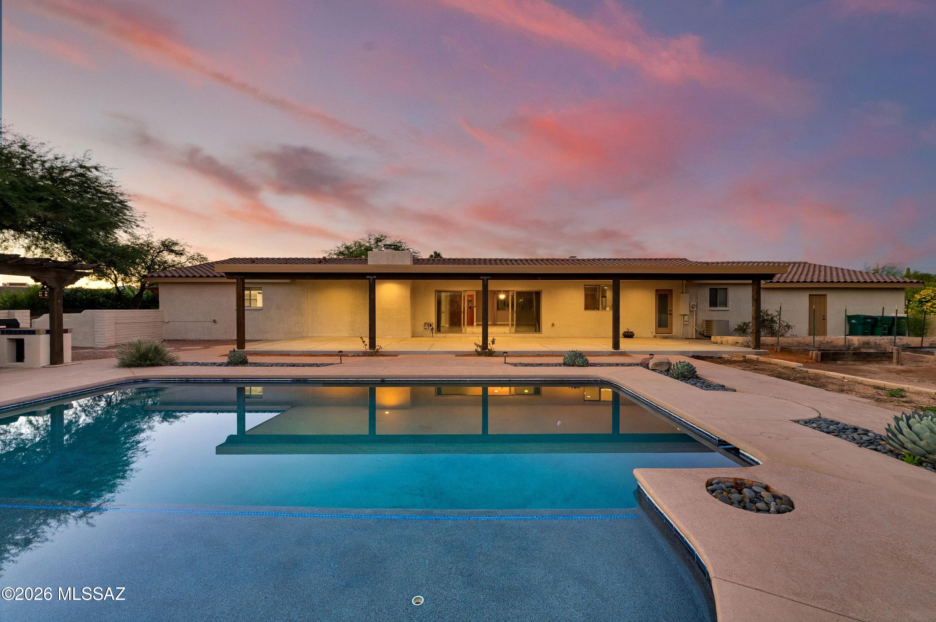 Set on a .67-acre cul-de-sac lot, this home offers updates galore! Over 3,100 sq ft includes 4 bedrooms plus an office, a chef's kitchen, and an expansive great room with two living spaces and a dining area. The stunning primary suite features a private patio, a large walk-in closet, and a gorgeous bathroom. Oversize garage with RV hookup, workshop and all the power you'll need. Outdoor living shines with a gazebo BBQ area, fireplace, and inviting seating overlooking the pool and grassy rear portion of the lot. Room to gather, relax, and enjoy, inside and out!  New roof in 2026, new exterior paint