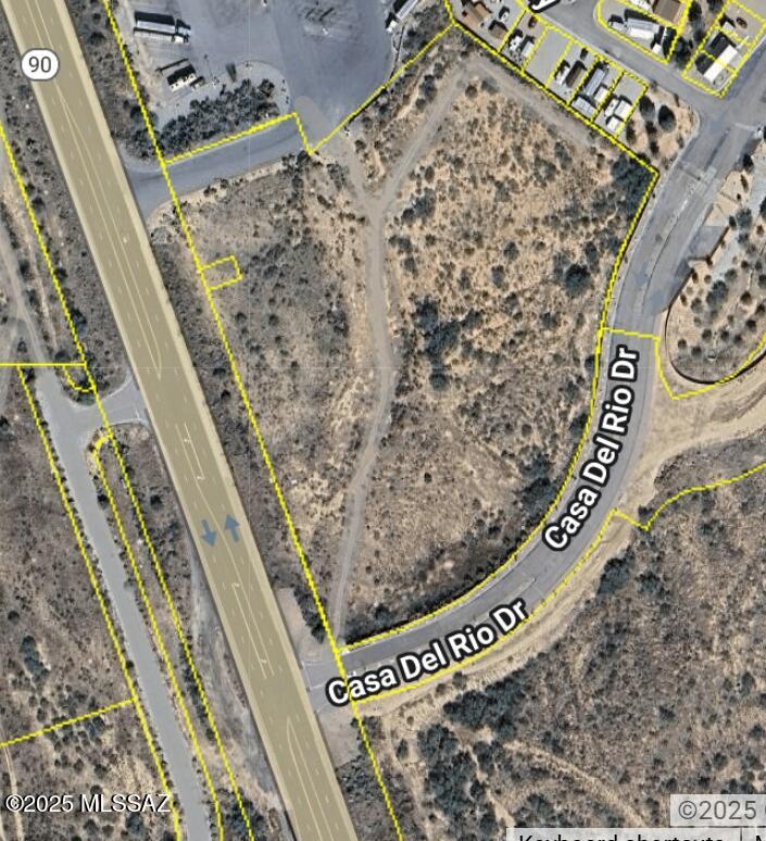 Great location with government benefits! Prime parcel off I-10 and Hwy 90: the gateway to fast growing Sierra Vista, Fort Huachuca, and the popular Kartchner Caverns State Park.  8.2 acre lot has 526 feet of frontage on Hwy 90 with two points of legal access. All utilities to the lot line.  The parcel has 12.5 million vehicles pass by annually and is within 2 government zones:  a Rural Opportunity Zone and a Foreign Trade Zone.  Either can be lucrative for those who take advantage of them.  LA has more details.  Lot is located next to a large Love's Travel Stop benefiting travel related businesses:  Motel, RV center, restaurant, grocery, etc.  Foreign Trade Zone benefits manufacturing, warehousing, and more.  Owner may split