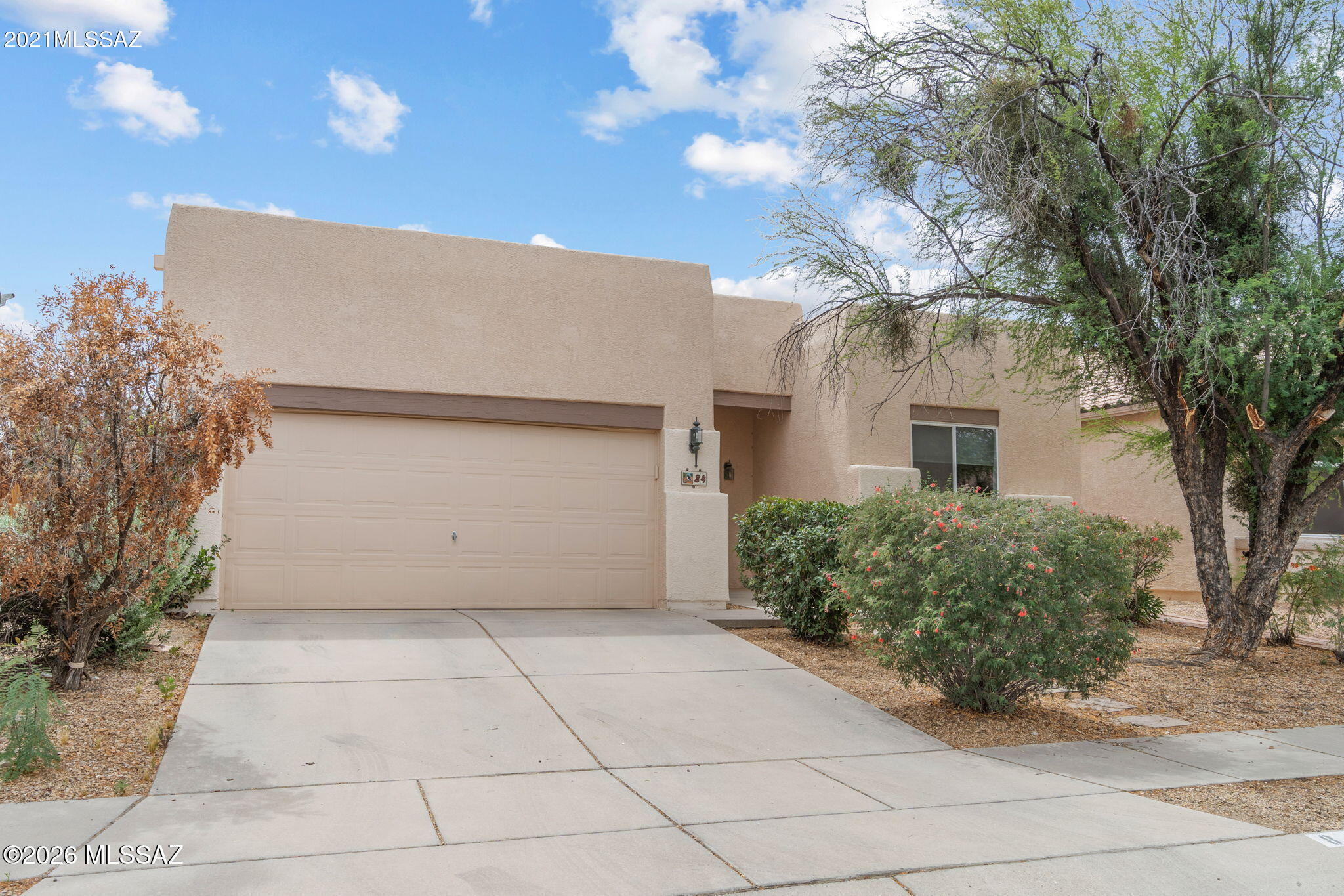 Some homes ask you to compromise; this one asks you to imagine. Pressed against the Tucson Mountains where saguaros outnumber streetlights, this 4-bedroom, 1,917 square foot retreat is a clean slate on the precipice of the Sonoran Desert. With miles of hiking and biking trails in Tucson Mountain Park, Arnold Palmer-designed championship golf at JW Marriott Starr Pass, and the eclectic dining and open-air energy of the Mercado district just a stone's throw away, you'll have to work hard to be bored. End every day with a dip in the sparkling pool, and fall asleep under the unobstructed desert sky. Every great chapter starts somewhere. This is a pretty good somewhere.